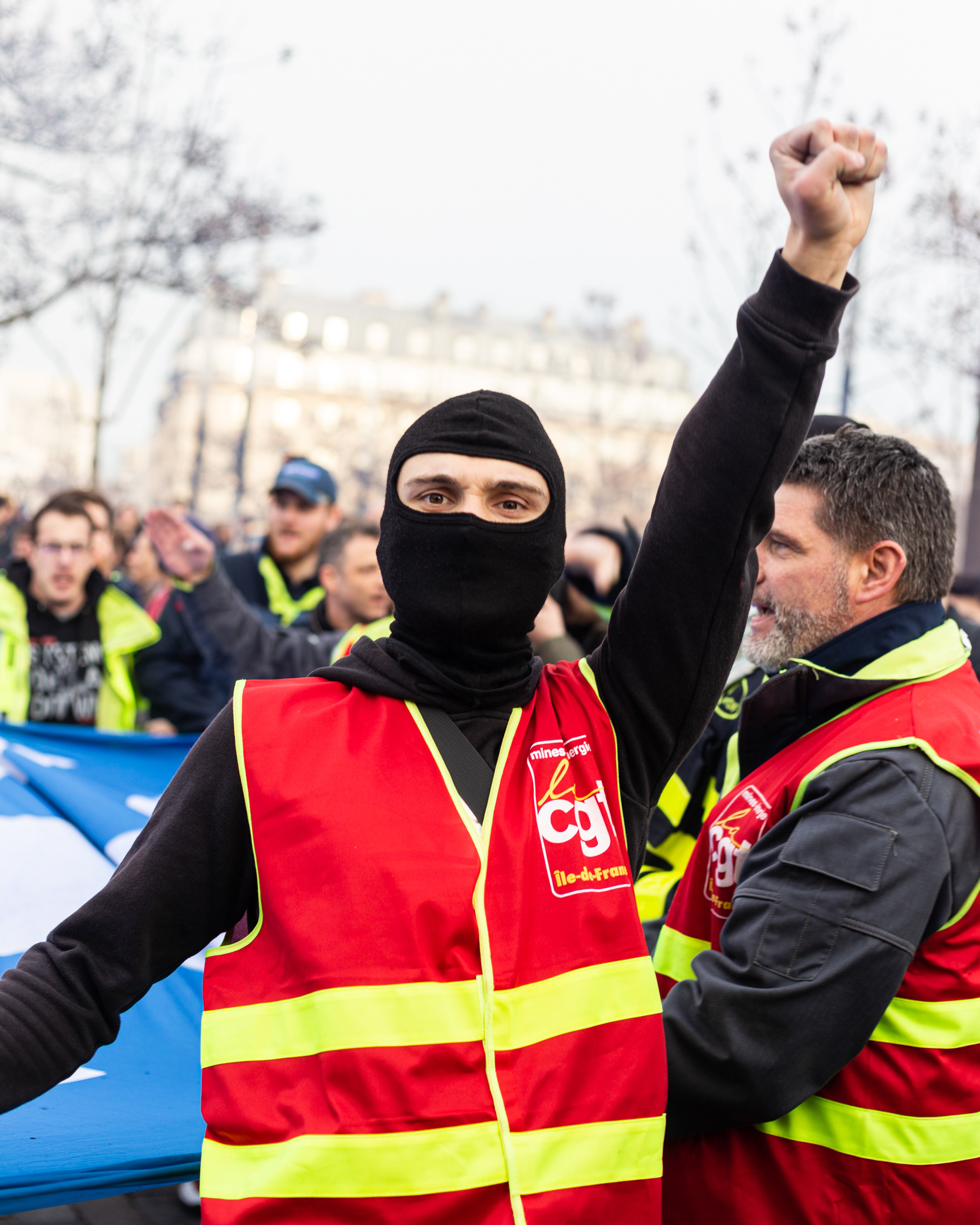 A man gestures during the demonstration. Thousands of French people gather and march on the streets of Paris on March 15, which marks the eighth general strike against the new Macron's pension reform.
