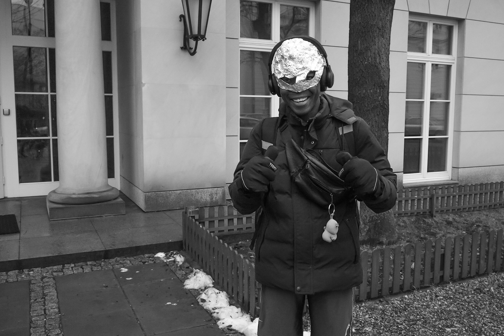 Delivery guy in aluminium foil helmet