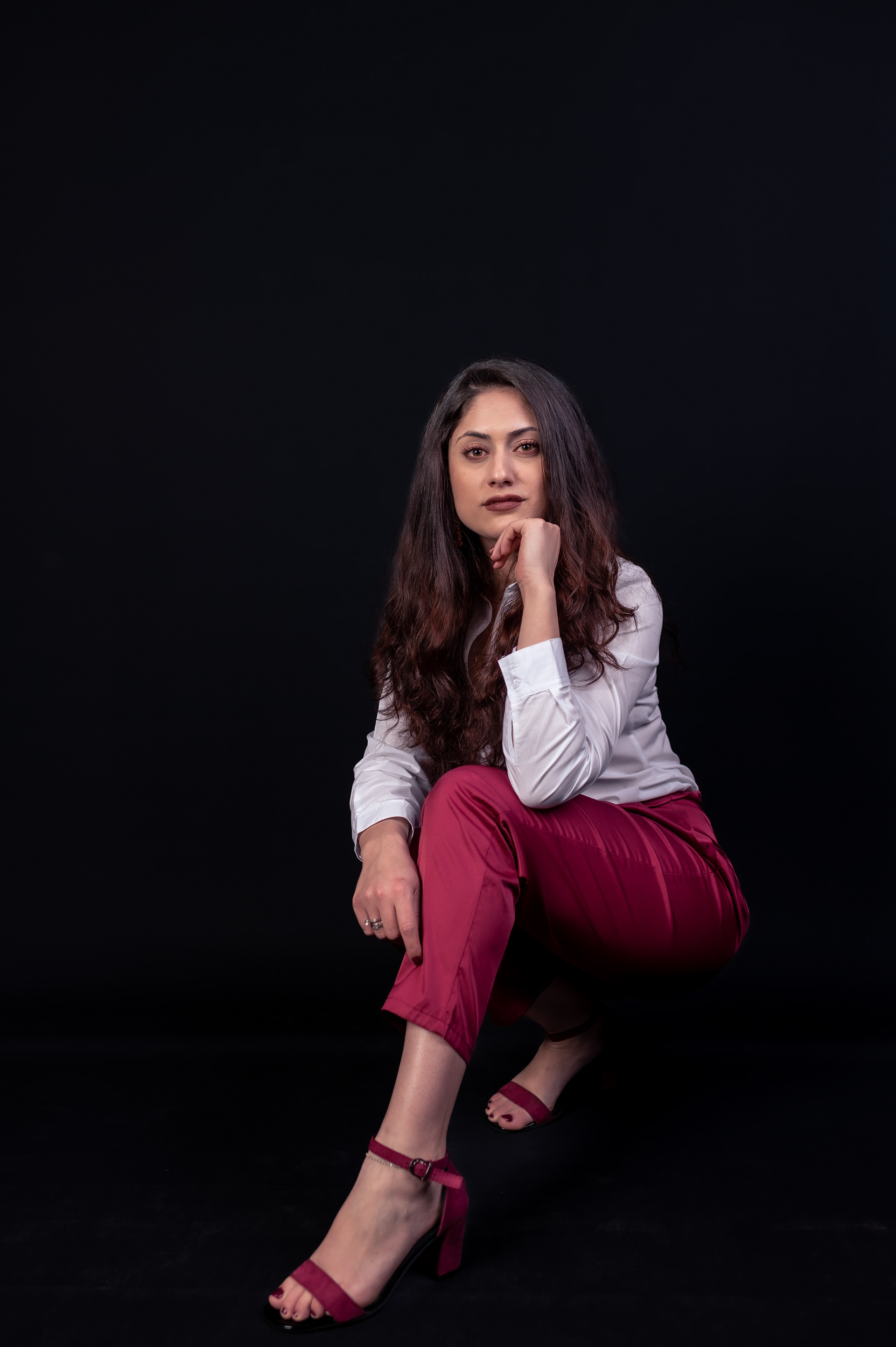 Business woman photo shoot in Bolton, Manchester, studio with black background 