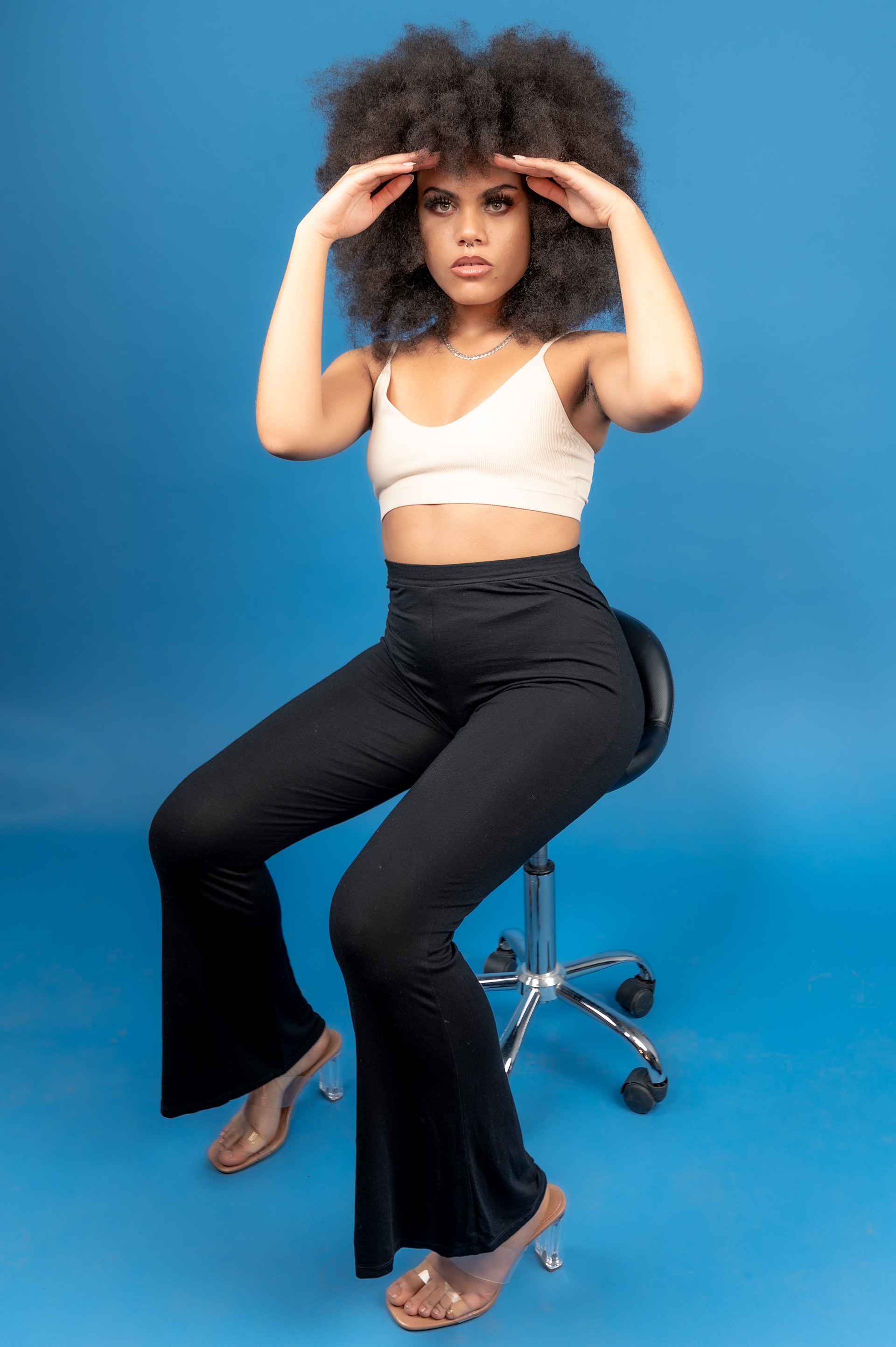 Model Photoshoot, Girl studio blue background, curly ebony photo session, afro hairstyle, Manchester , fashion 