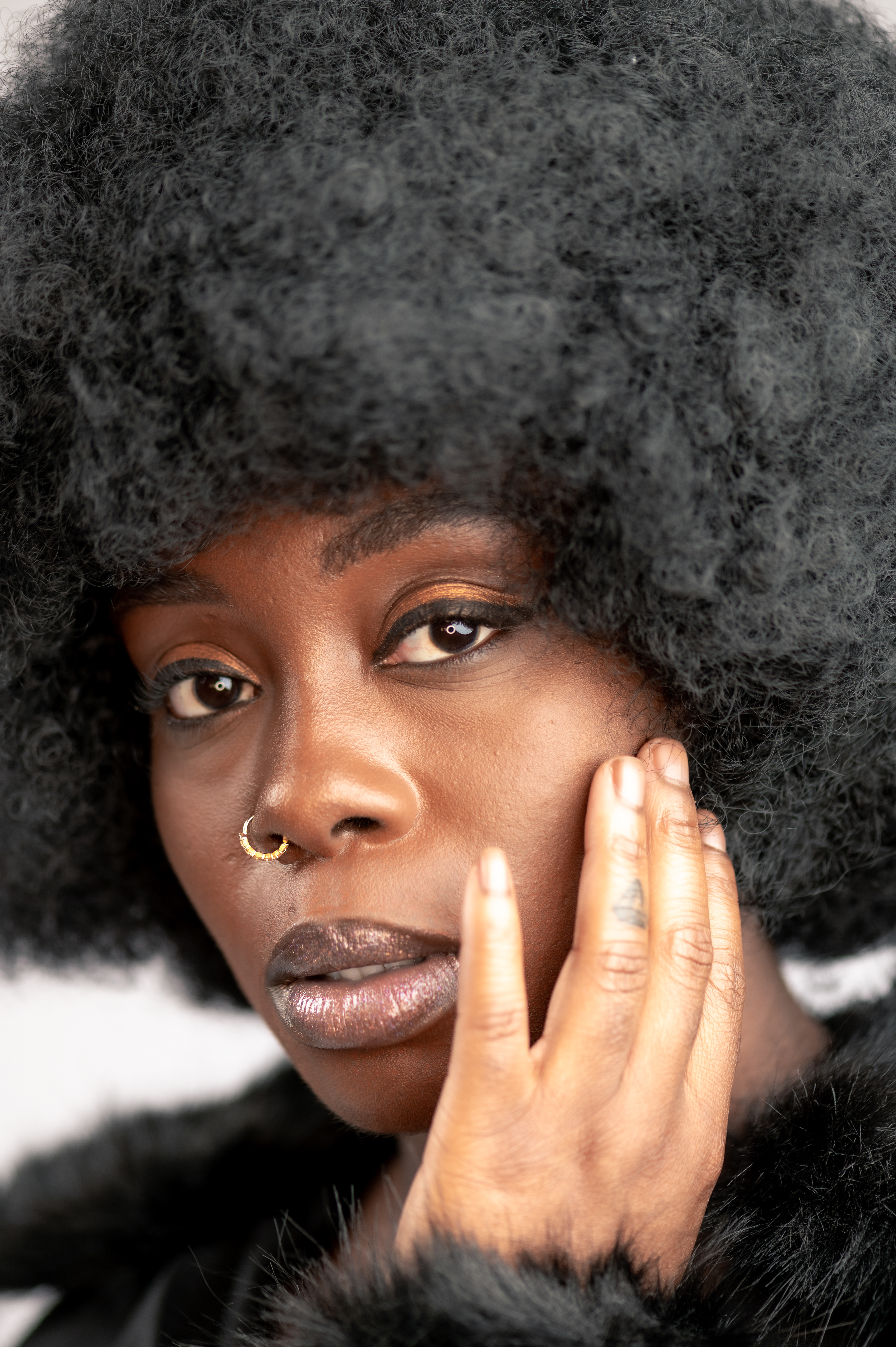 Afro Style Model, dark skin, white background studio photo shoot in Manchester