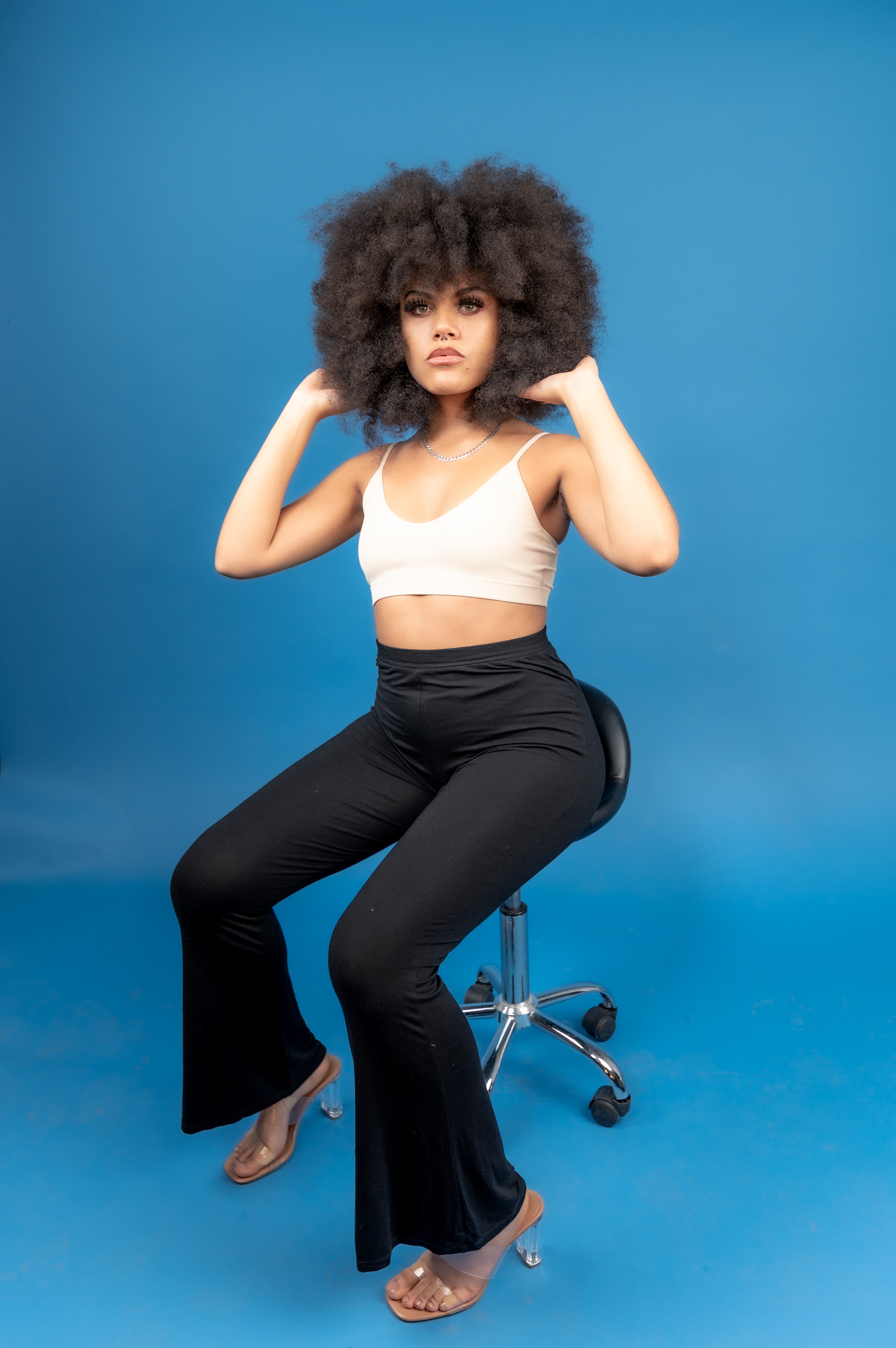 Model Photoshoot, Girl studio blue background, curly ebony photo session, afro hairstyle, Manchester 