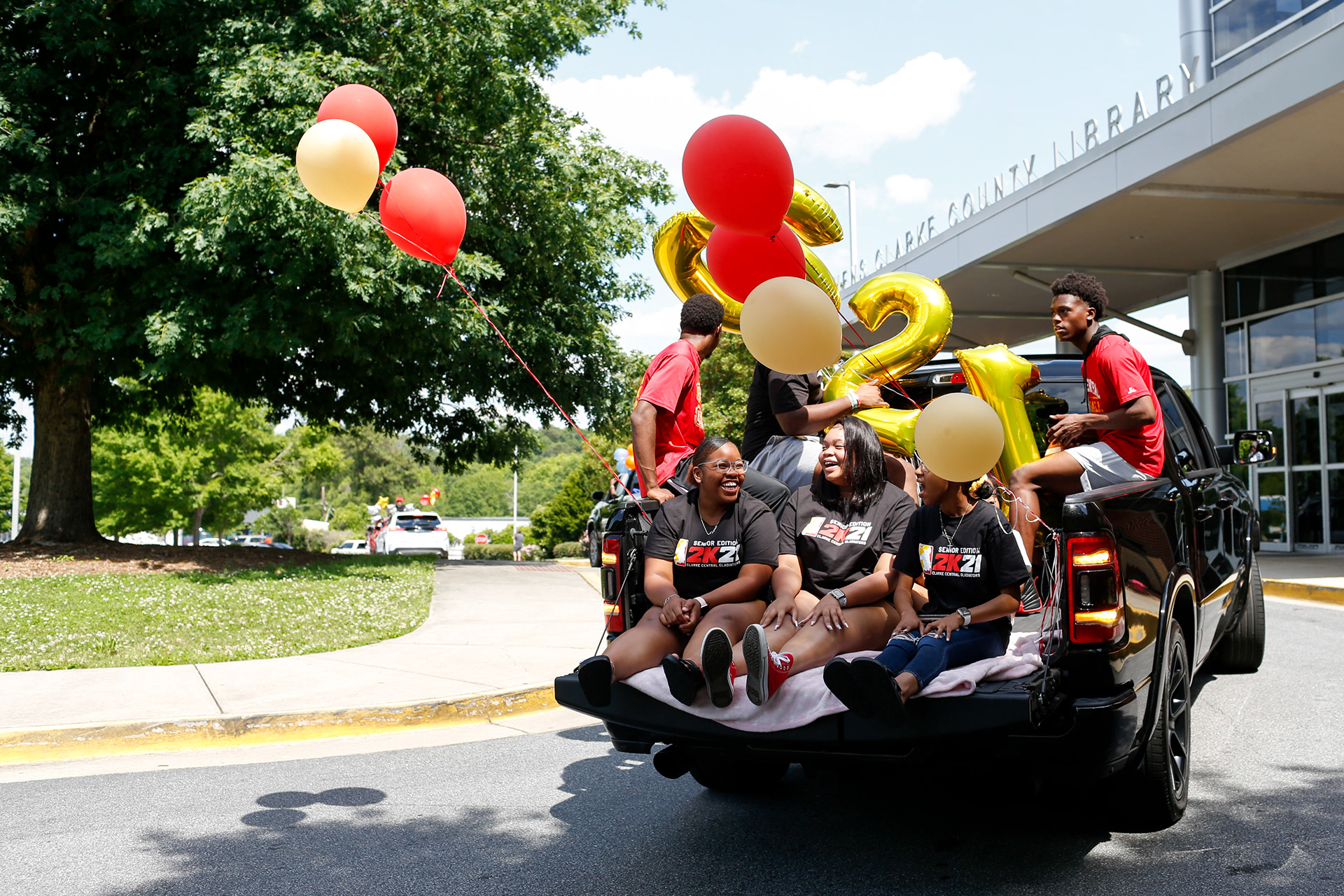 Clarke Central graduates drive off at the 2021 graduation caravan organized by Athens Anti-Discrimination Movement in Athens, Georgia, on May 16, 2021.