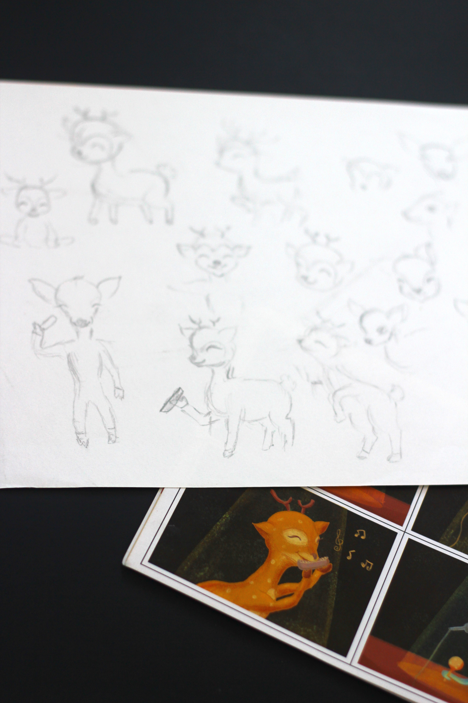 The Missing Prizes children's book: deer character sketches with a printed spread