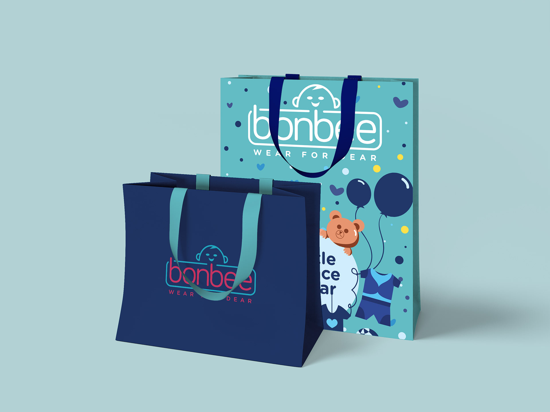 Bonbee Indian baby wear brand and package design: shopping bags for boys in navy and teal with teddy illustration