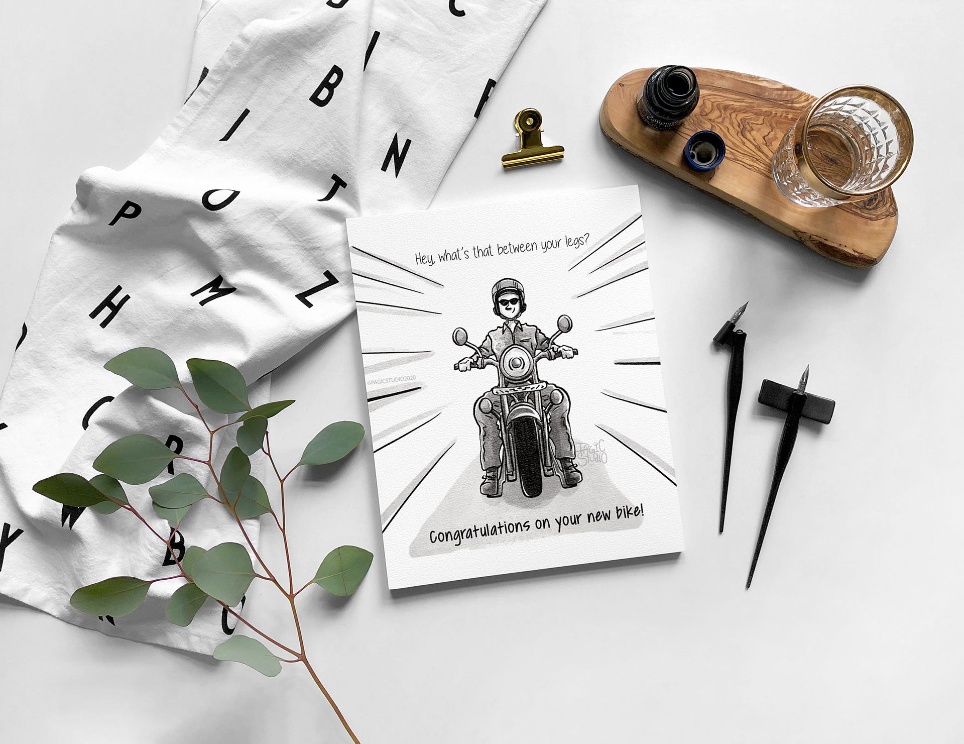 12 pun congratulatory illustrations: #2 Congratulations card of a biker in a flat lay