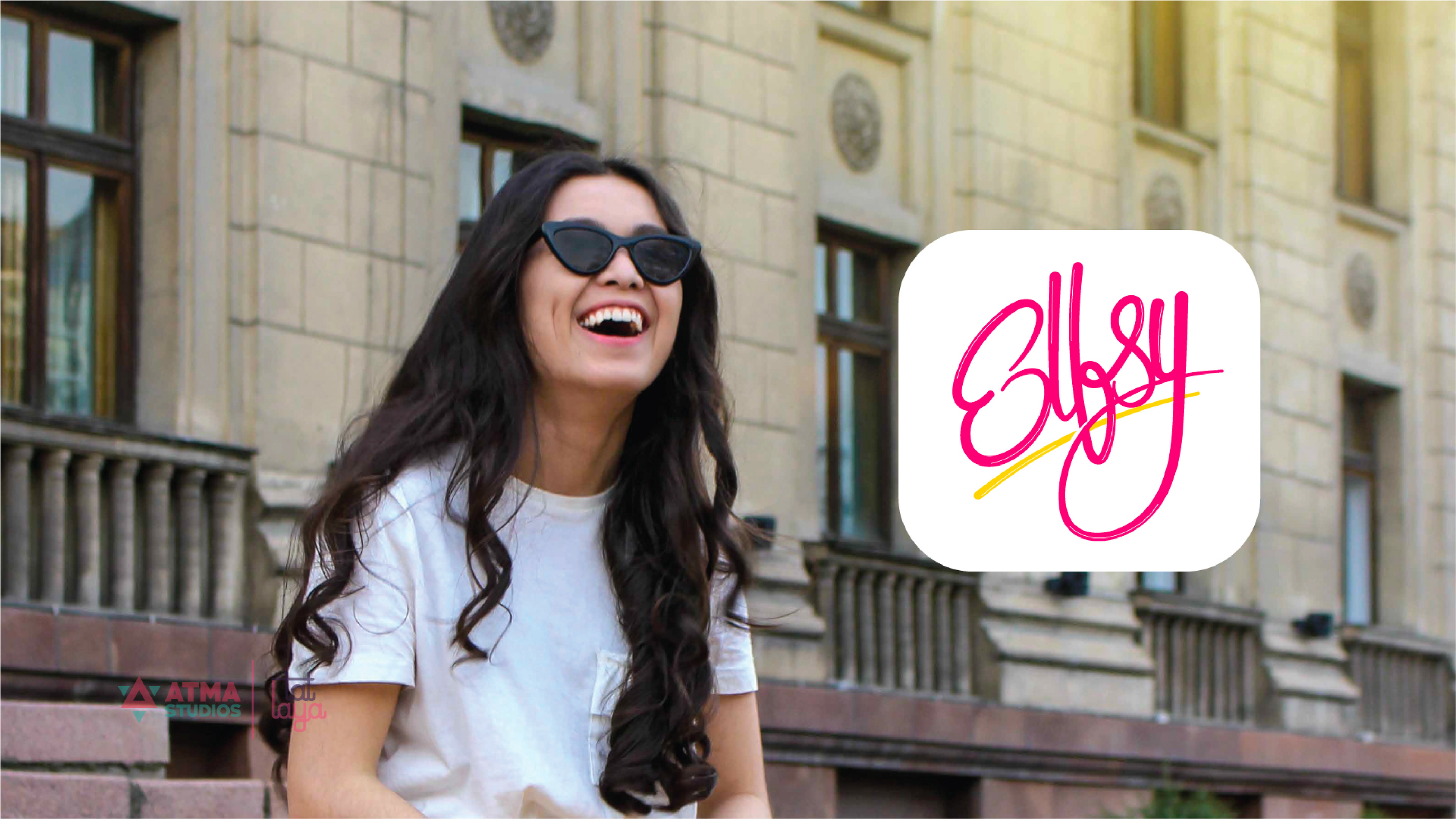 Elfsy girls clothing brand: logo option 1 beside a smiling woman in sunglasses