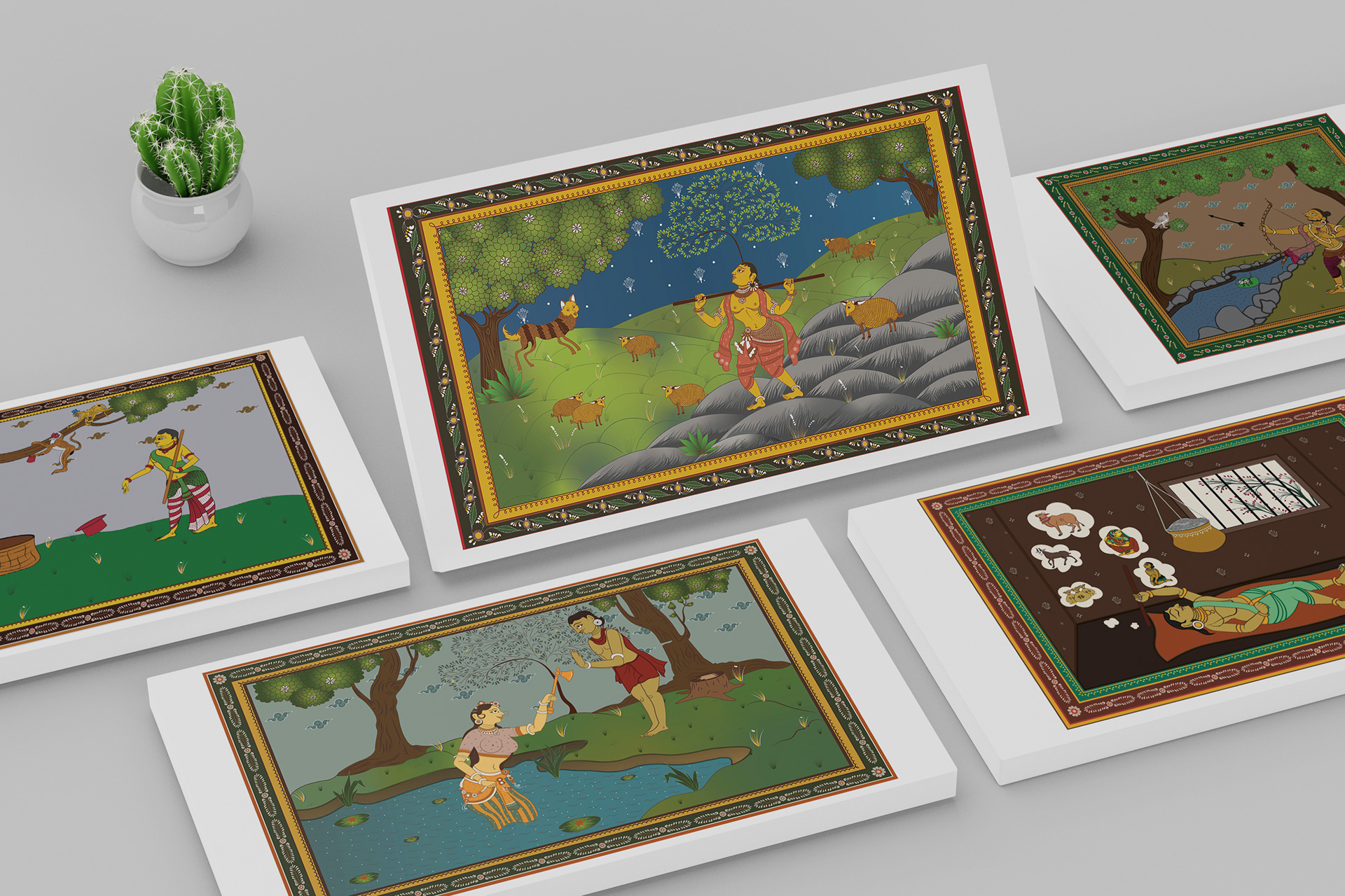 Panchatantra stories in Pattachitra style: printed story prints laid out on a table, illustration by Atma Studios