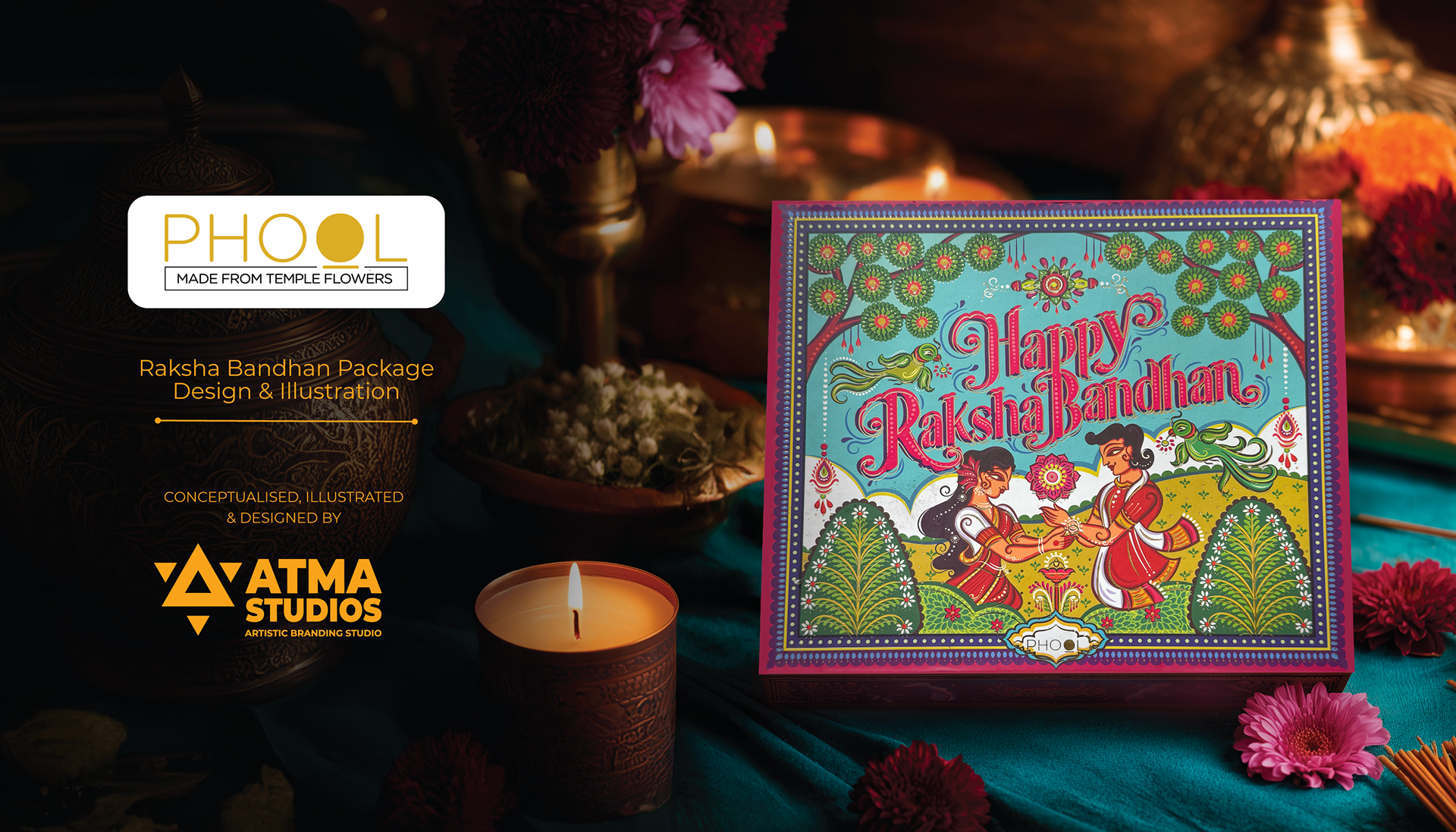 Phool Raksha Bandhan gift box packaging: finished gift box beside lit candles, illustration and package design by Atma Studios
