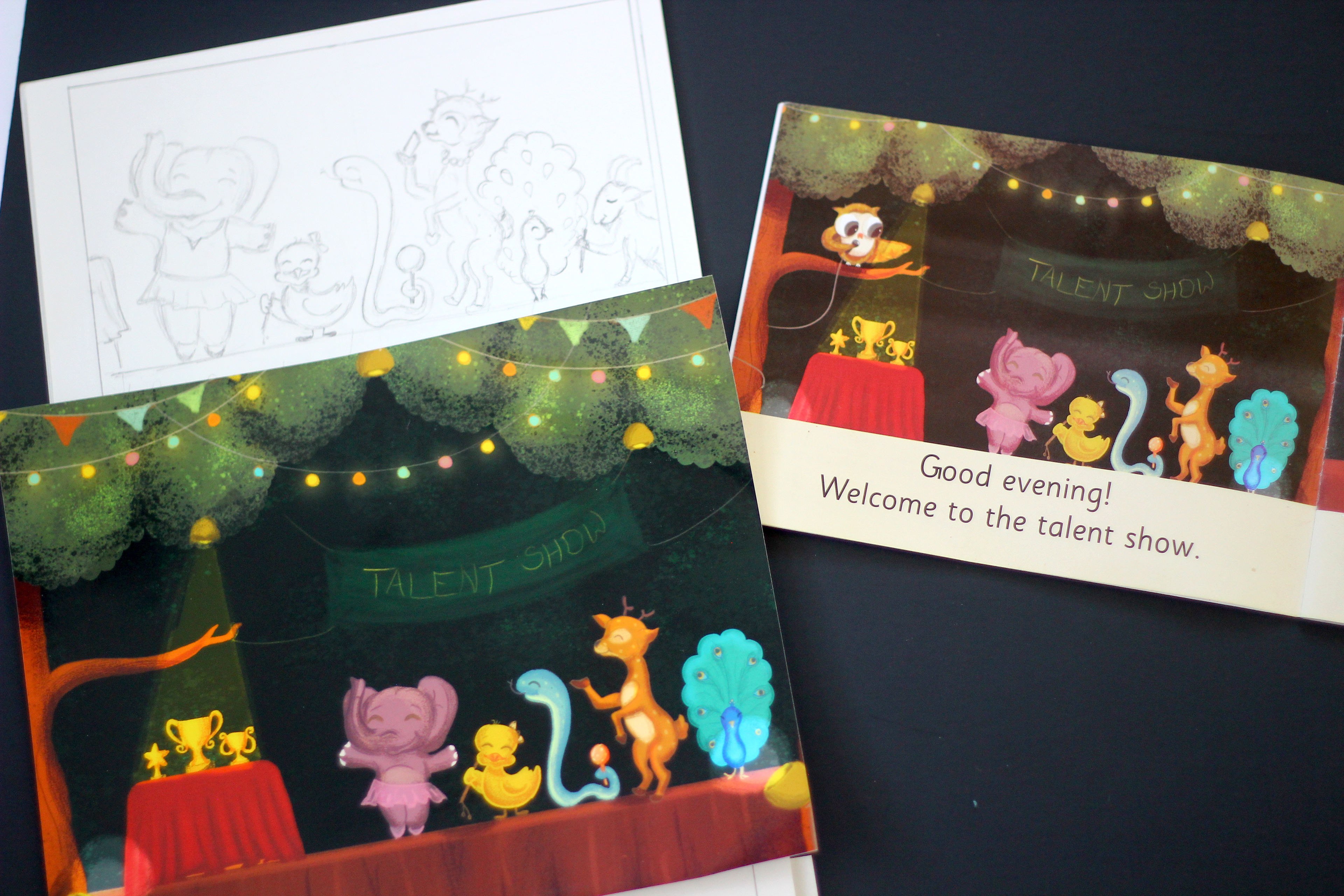 The Missing Prizes children's book: sketch and printed spread welcoming the talent show