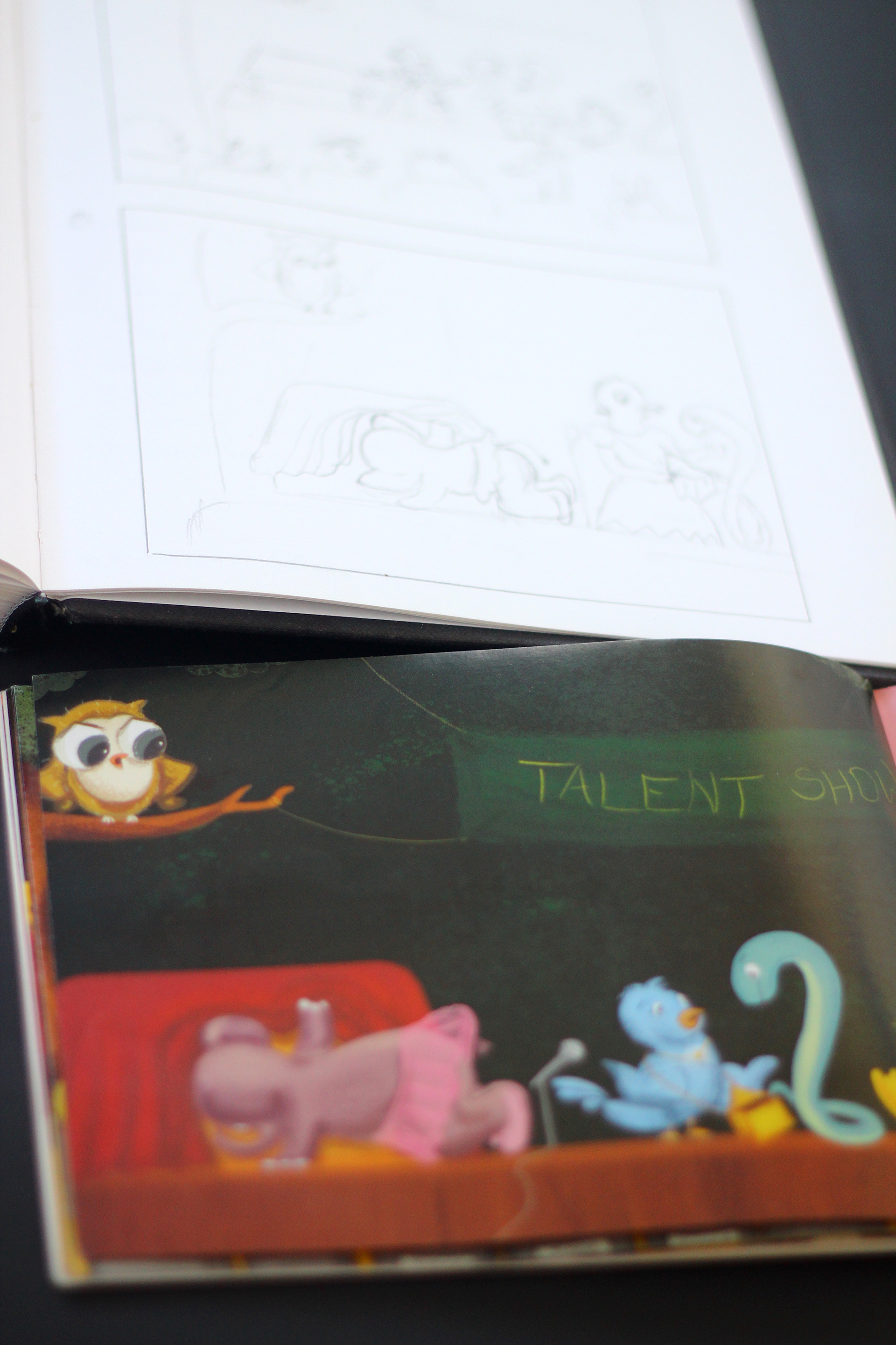 The Missing Prizes children's book: sketch and printed spread of the talent show finale
