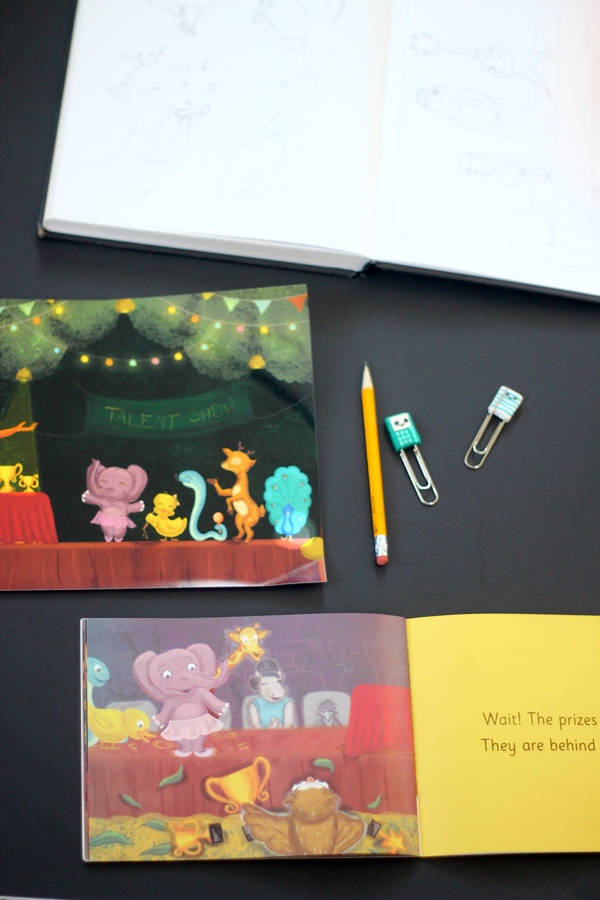 The Missing Prizes children's book: printed book with pencil, clips and an elephant spread