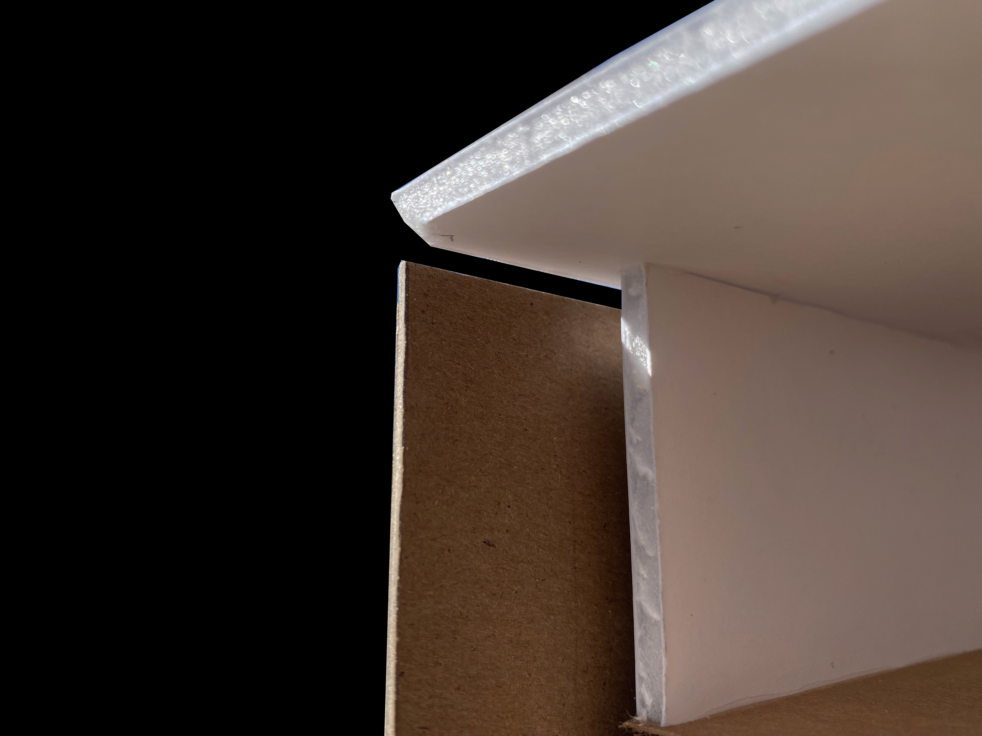 HOW THE EXTERIOR CLADDING MEETS THE ROOF