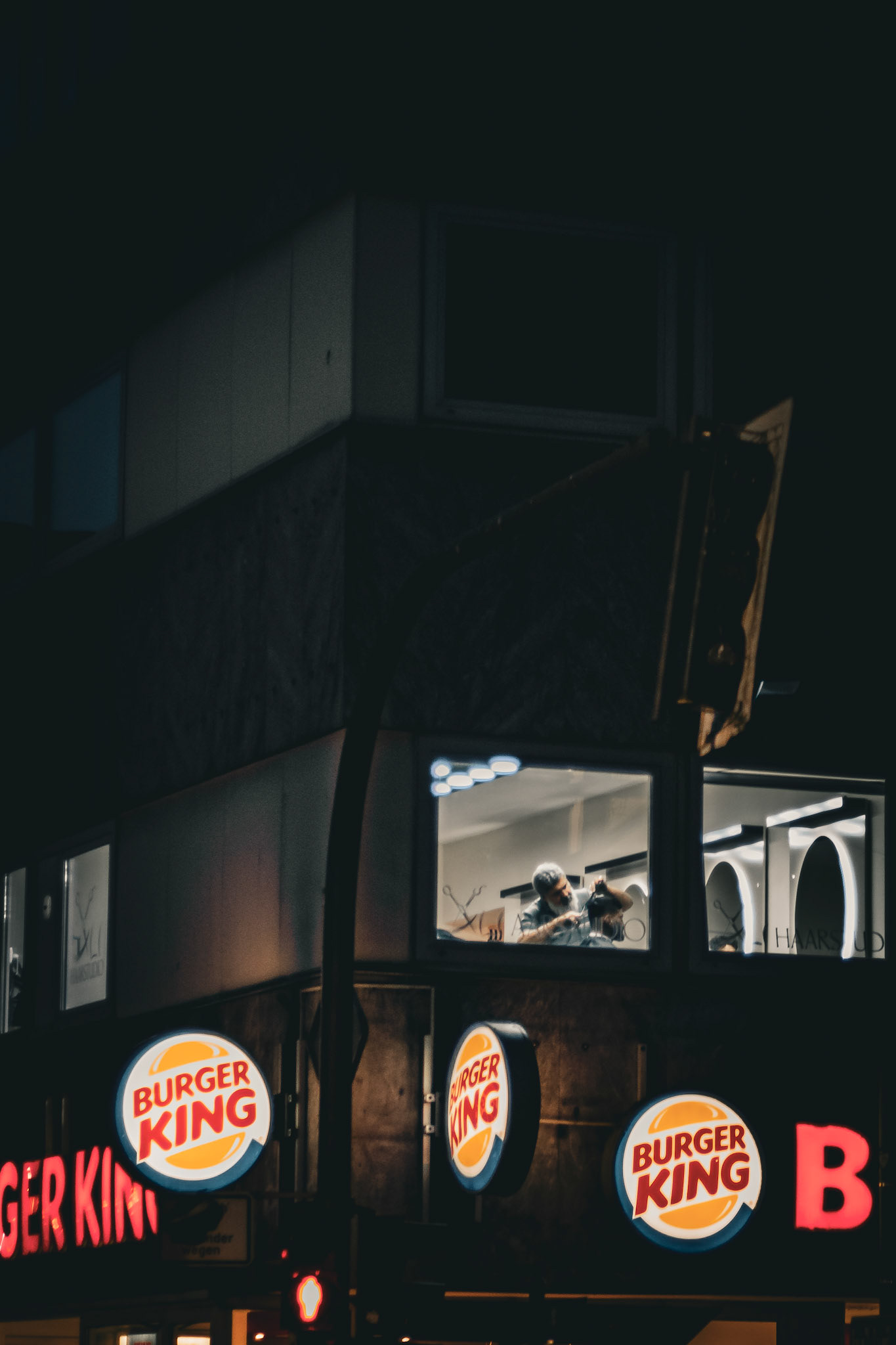 barber above a burger king