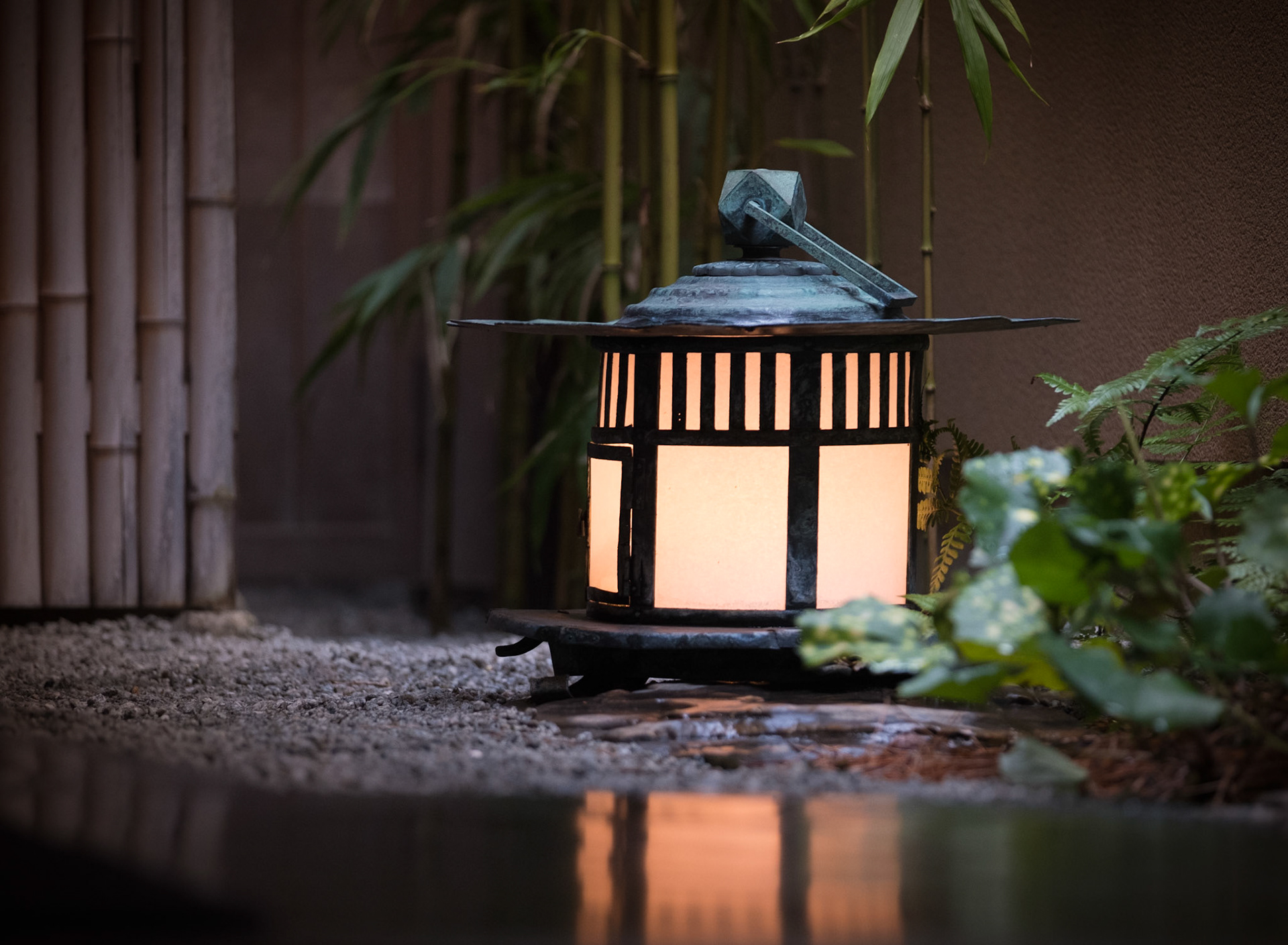 Japanese lantern in a mini Zen garden in someone's home.