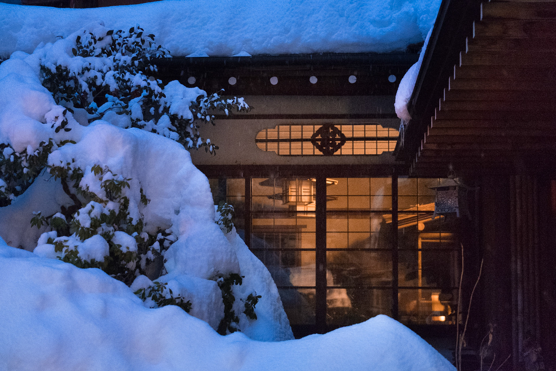 Snowy exterior of a traditional Japanese Hotspring Inn