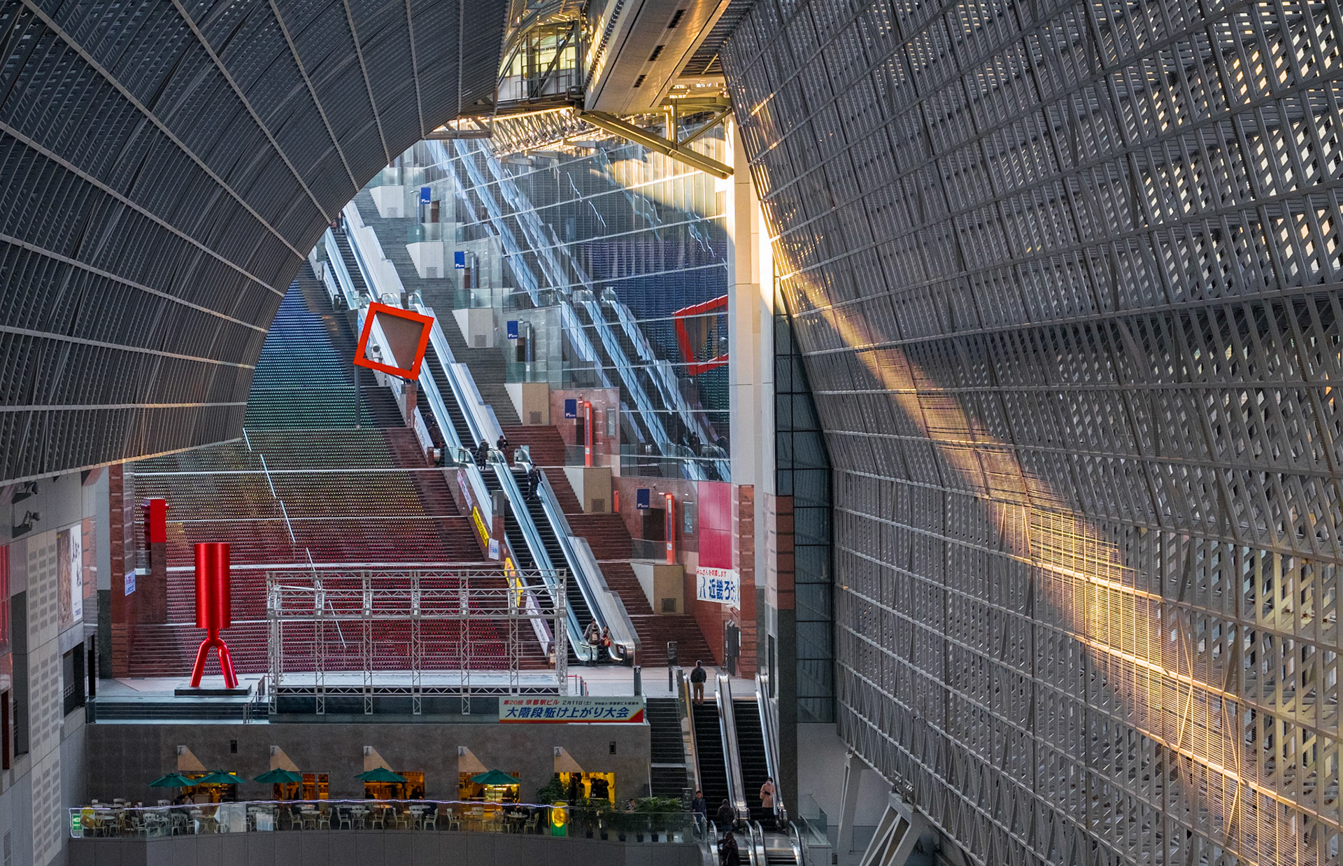 Interior photo of the very large Kyoto Station.