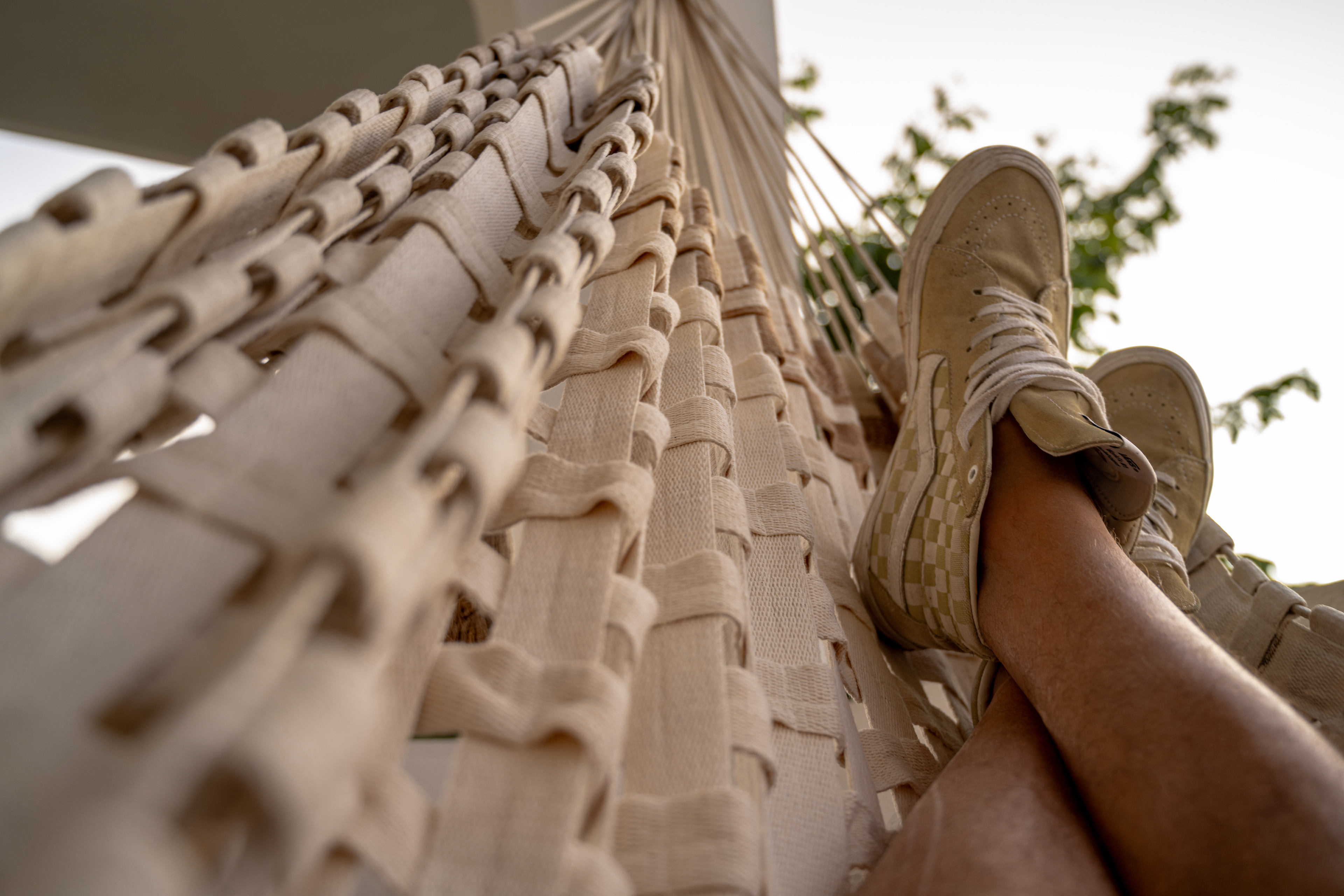 A hammock swaying gently in the breeze, , capturing the peaceful serenity of the moment at Hacienda Eterna Primavera. The quiet atmosphere invites relaxation and tranquility.