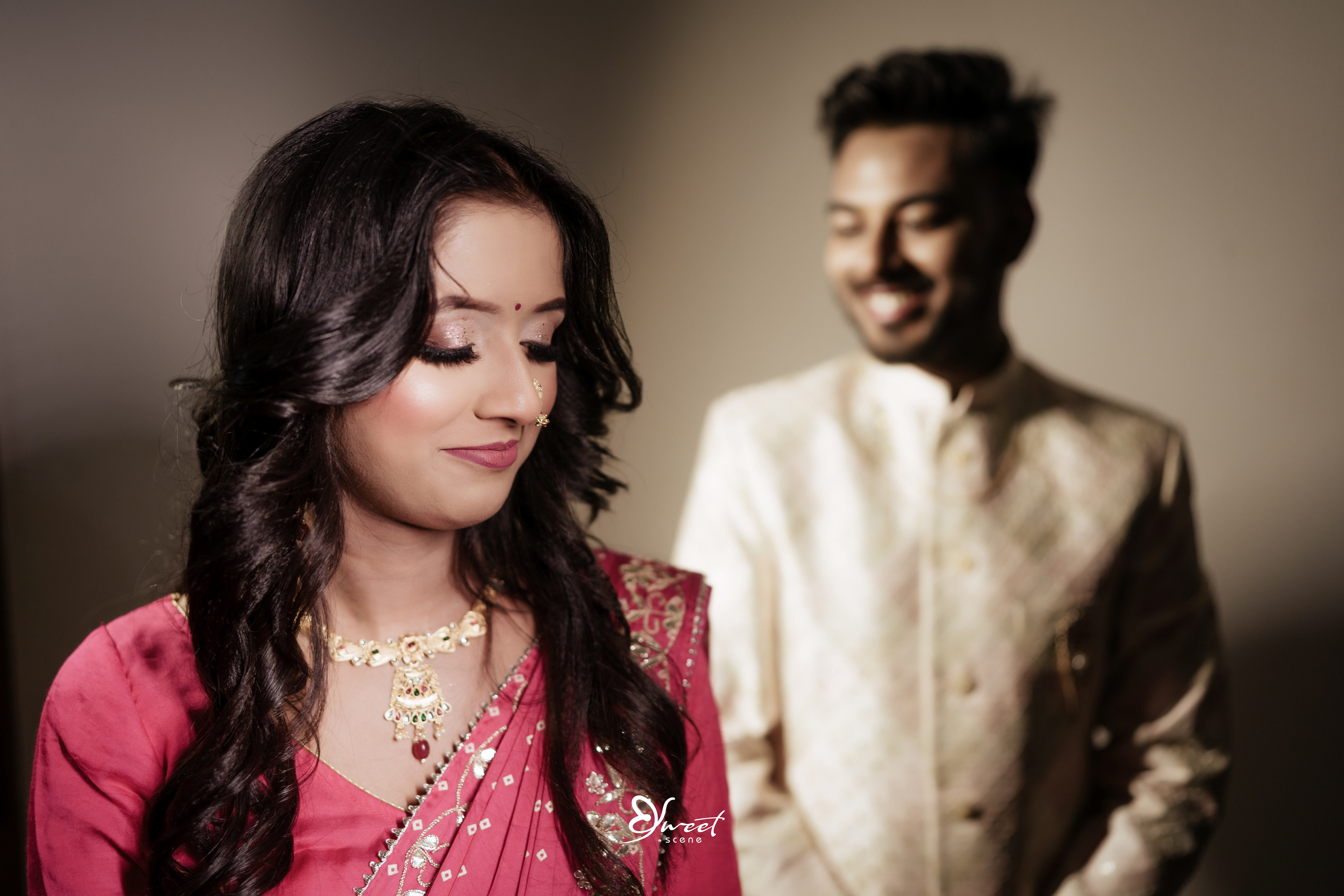 Prakhar and Madhu walking under the fairy lights, their hands intertwined, looking towards the future with hope and excitement.