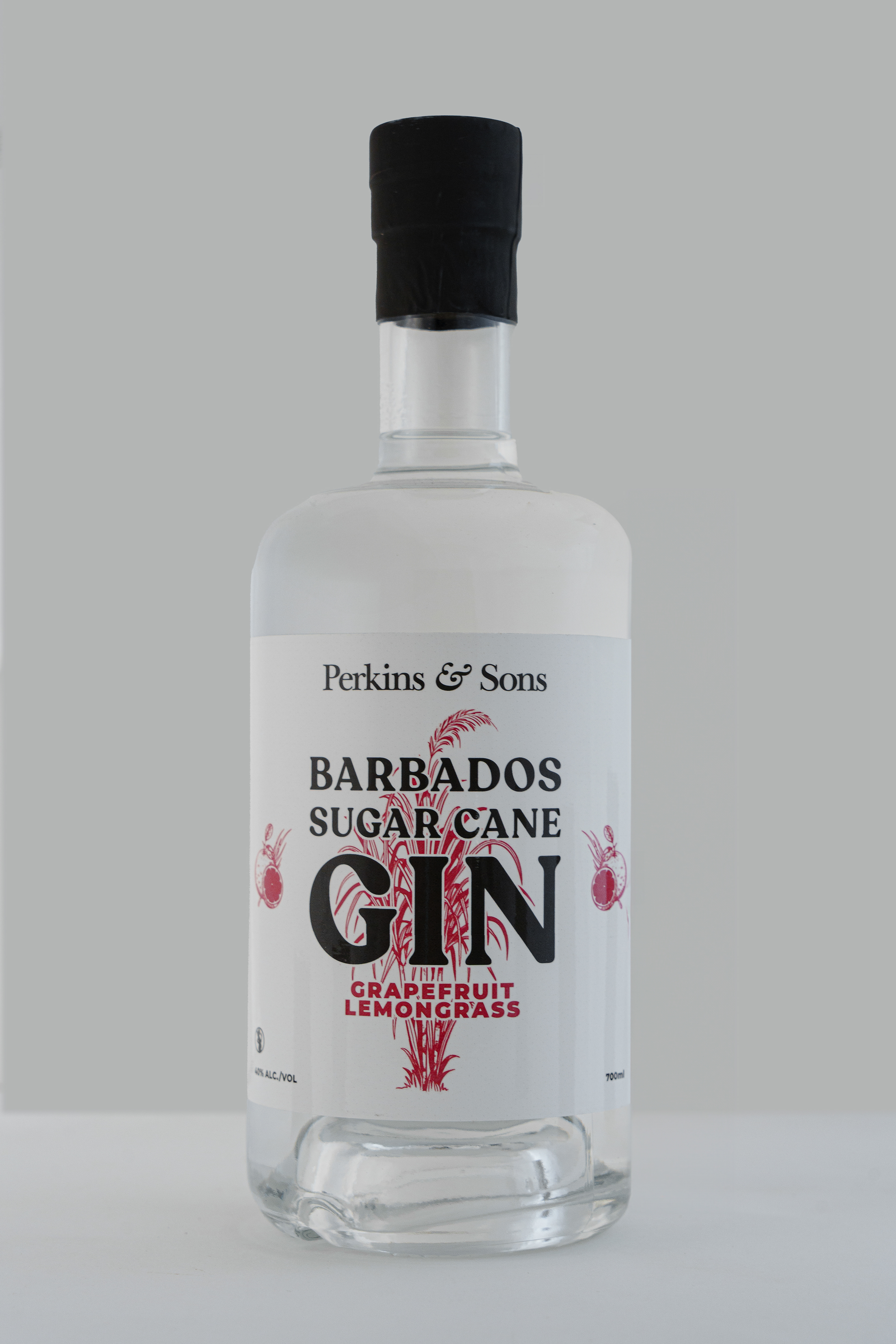 Perkins & Sons Barbados Sugar Cane Gin, Grapefruit Lemongrass flavour, product shot on grey background