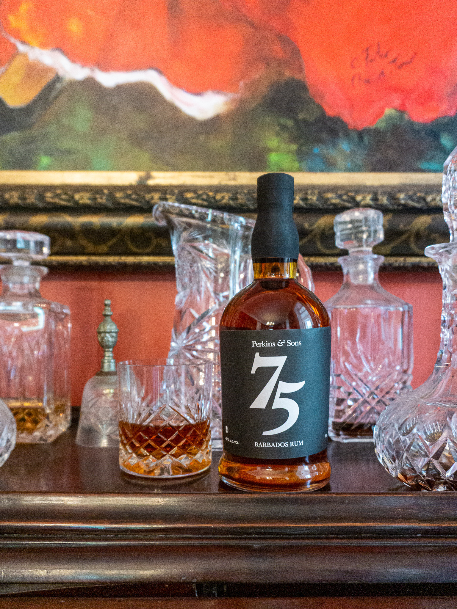 Perkins & Sons 75th Anniversary Rum bottle photographed on location at Lancaster Great House, Barbados