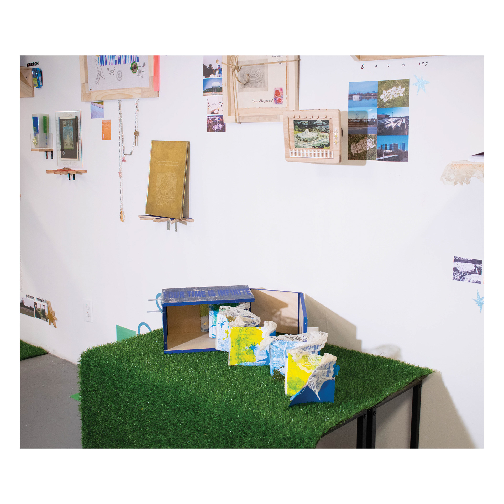 Queens Museum: Think of yourself as a relic sleeping, 2024, Screenprint, dye sublimation, and laser etch on wood (Exterior), Screenprint, graphite, colored pencil, acrylic, gold leaf, secondhand lace trim (Interior), 12" x 10" x 7" (Closed) 12" x 30" x 7" (Open)