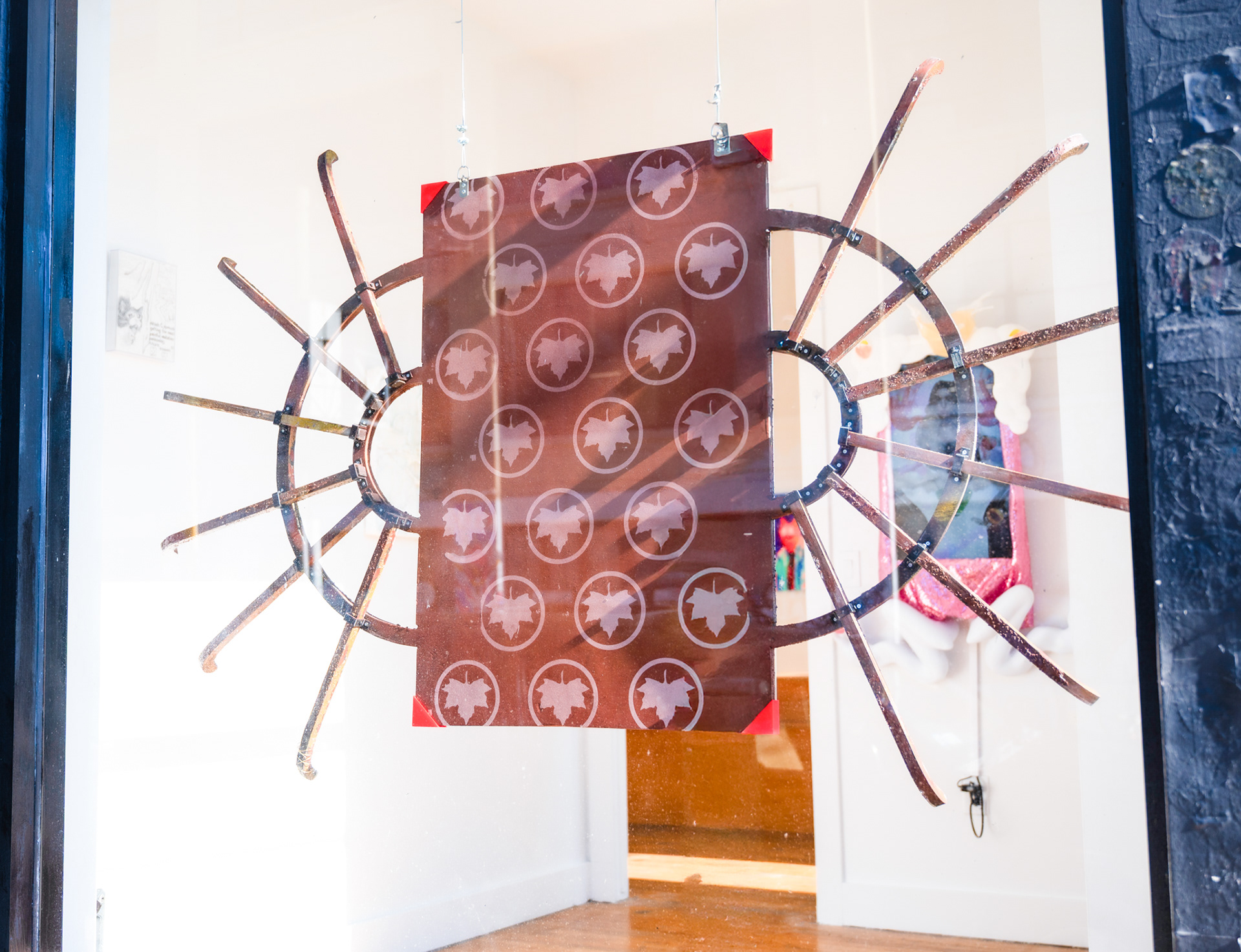 Trespassing Ruminations, 2025, screenprint on acrylic mounted with 3D printed custom parts in artist’s frame (spray paint, coffee grounds, and acrylic on wood with 3D printed custom parts), 73 x 48 x 2.5” (Photo credit: Lafayette Elizabeth Orzack)