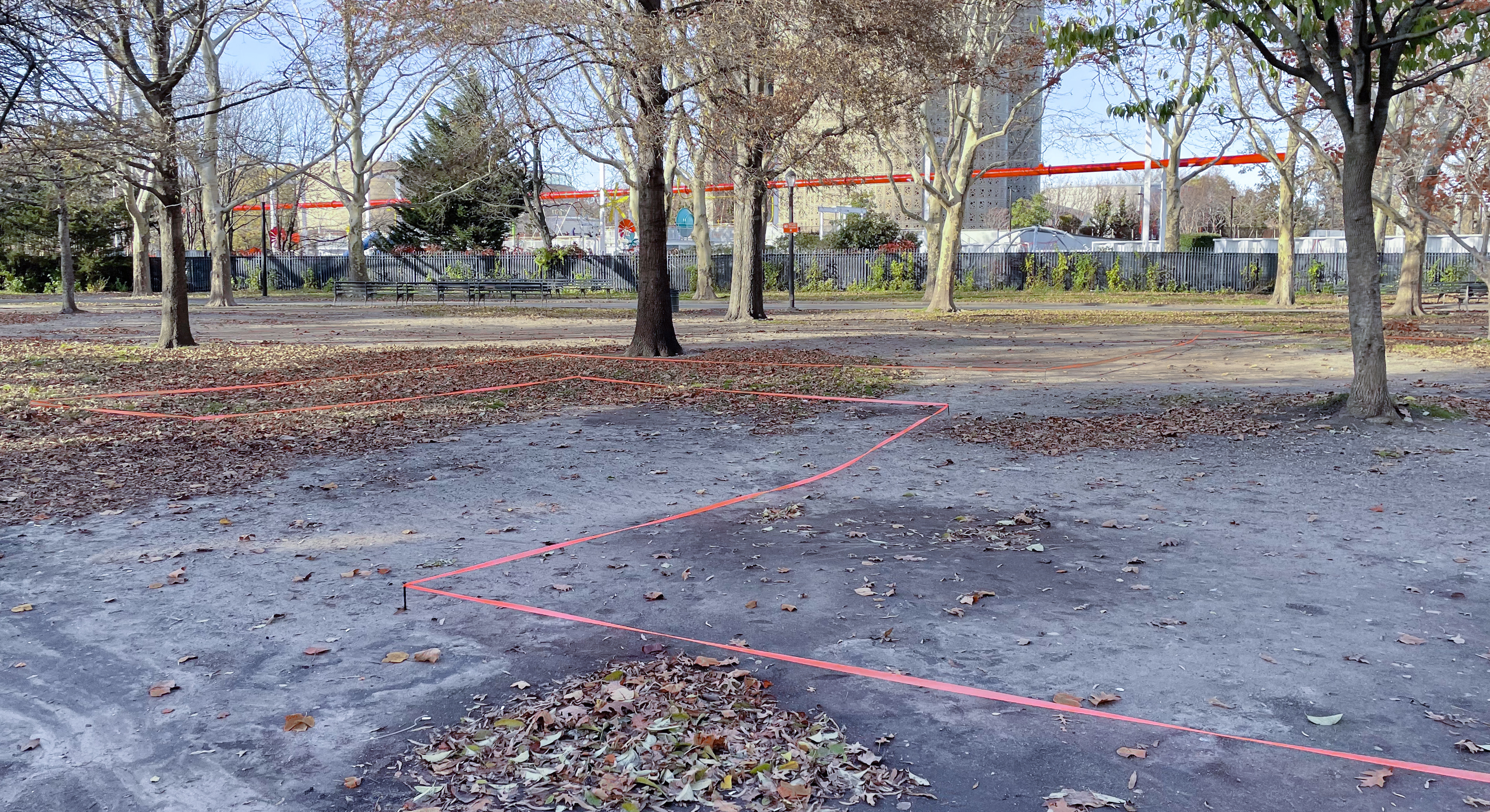 Mappings: The Underground Home, 2023, plastic stakes and survey tape, 110' x 69'