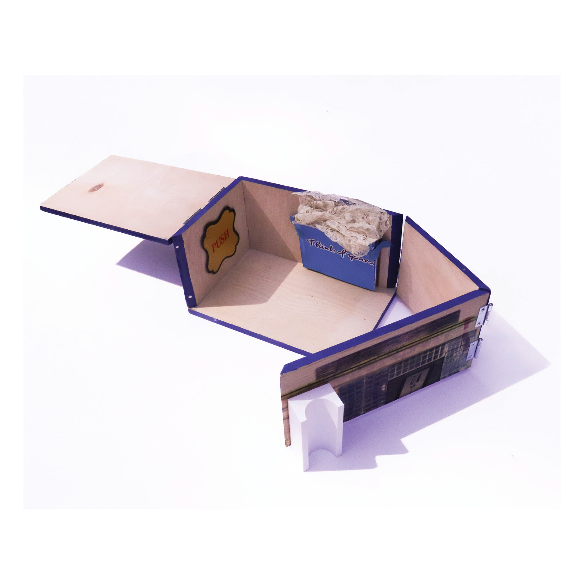 Queens Museum: Think of yourself as a relic sleeping, 2024, Screenprint, dye sublimation, and laser etch on wood (Exterior), Screenprint, graphite, colored pencil, acrylic, gold leaf, secondhand lace trim (Interior), 12" x 10" x 7" (Closed) 12" x 30" x 7" (Open)