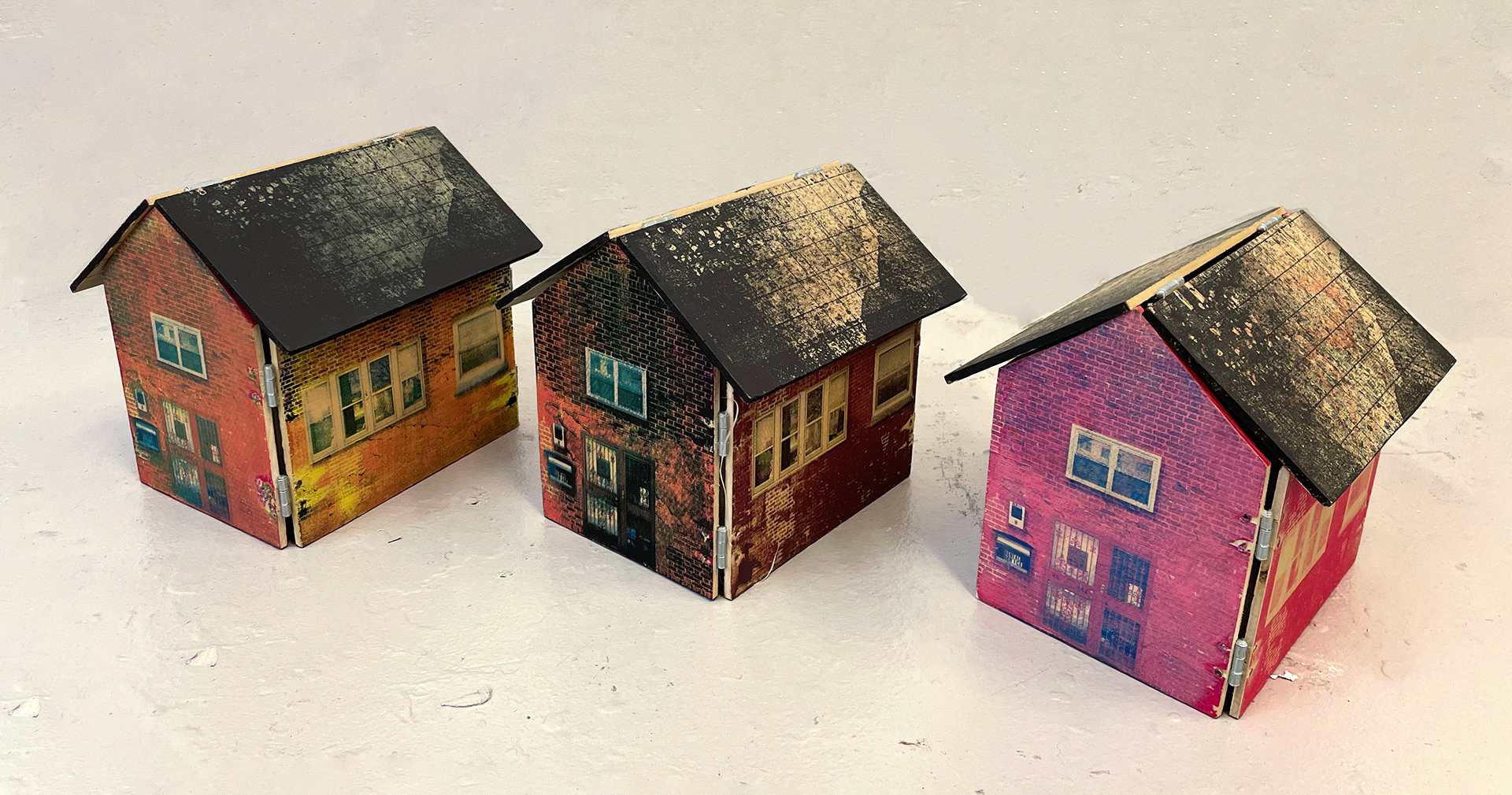 Where Do We Go From Here? 2023, Screenprint on plywood (Exterior), Screenprint, monoprint, image transfer, lasercut cardstock, chine collé, and ink on Mohawk (Interior), 6" x 8" x 7.5"  (Closed) 37" x 36" (Open)