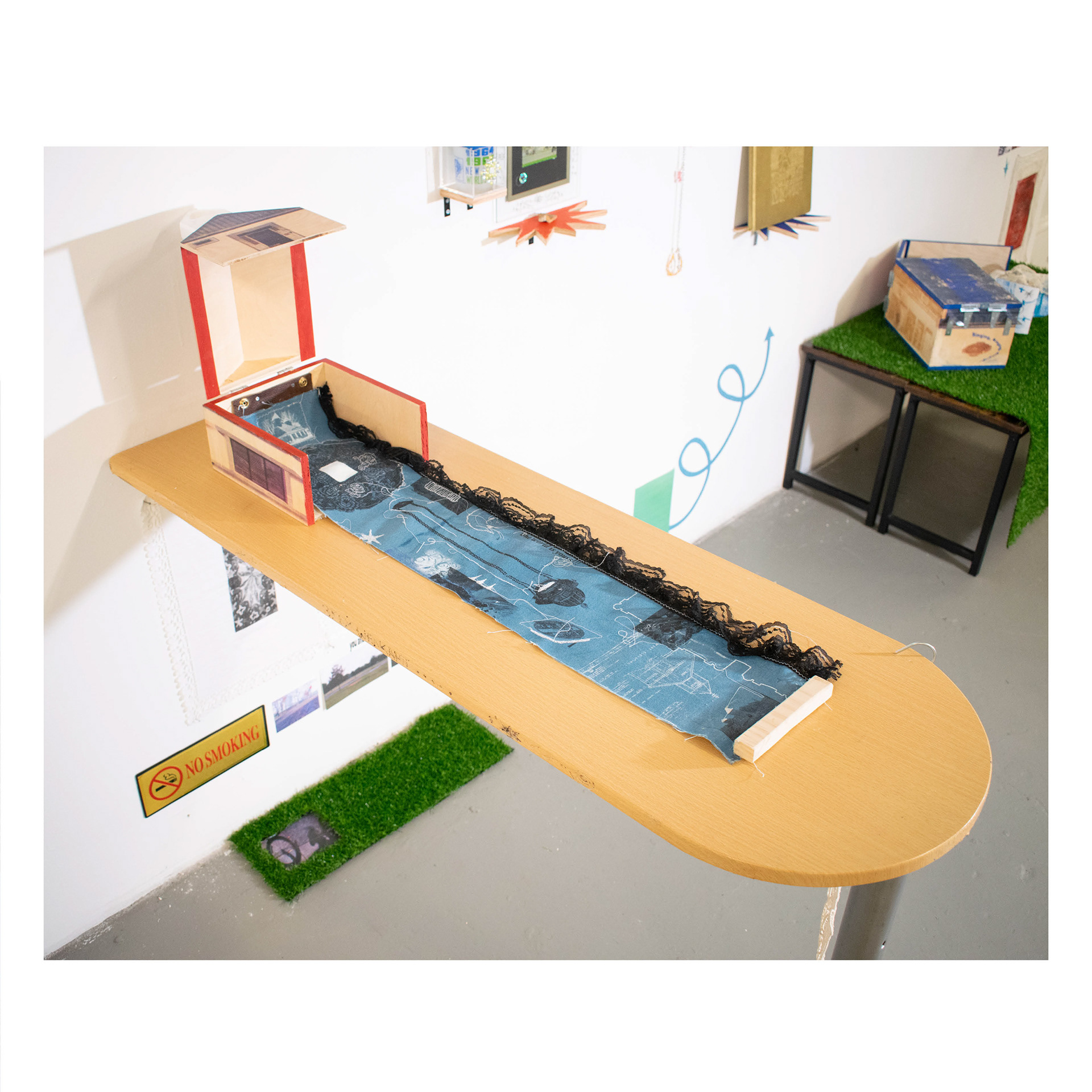 Russian Orthodox Pavilion: зубы шелкают 2024 Screenprint, lasercut, and dye sublimation on wood (Exterior) Screenprint, embroidery, acrylic, and secondhand lace trim on canvas (Interior) 5" x 8" x 7" (Closed) 5" x 25" x 7" (Open)