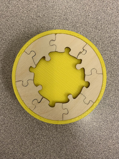 Testing fit of laser cut puzzle