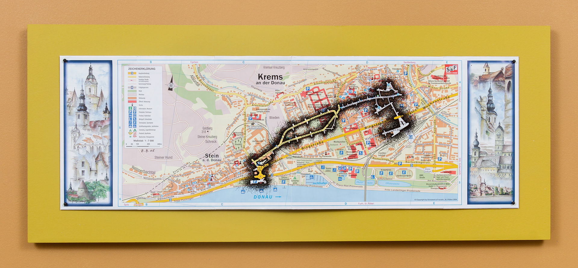 [K1a] Ant Farm Self-Portrait: Where did I travel within Krems-Stein, Austria from 25/7/05-18/8/05? - Day 15: 8/8/05, 2005-08 archival ink on tourist map pinned on painted wood panel 8 x 24 x 1 in (20.32 x 60.96 x 2.54 cm)