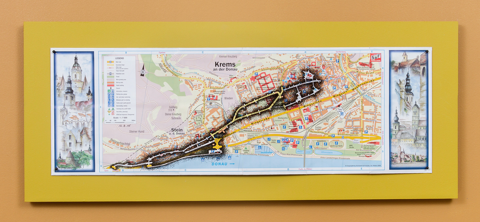 [K1a] Ant Farm Self-Portrait: Where did I travel within Krems-Stein, Austria from 25/7/05-18/8/05? - Day 19: 12/8/05, 2005-08 archival ink on tourist map pinned on painted wood panel 8 x 24 x 1 in (20.32 x 60.96 x 2.54 cm)