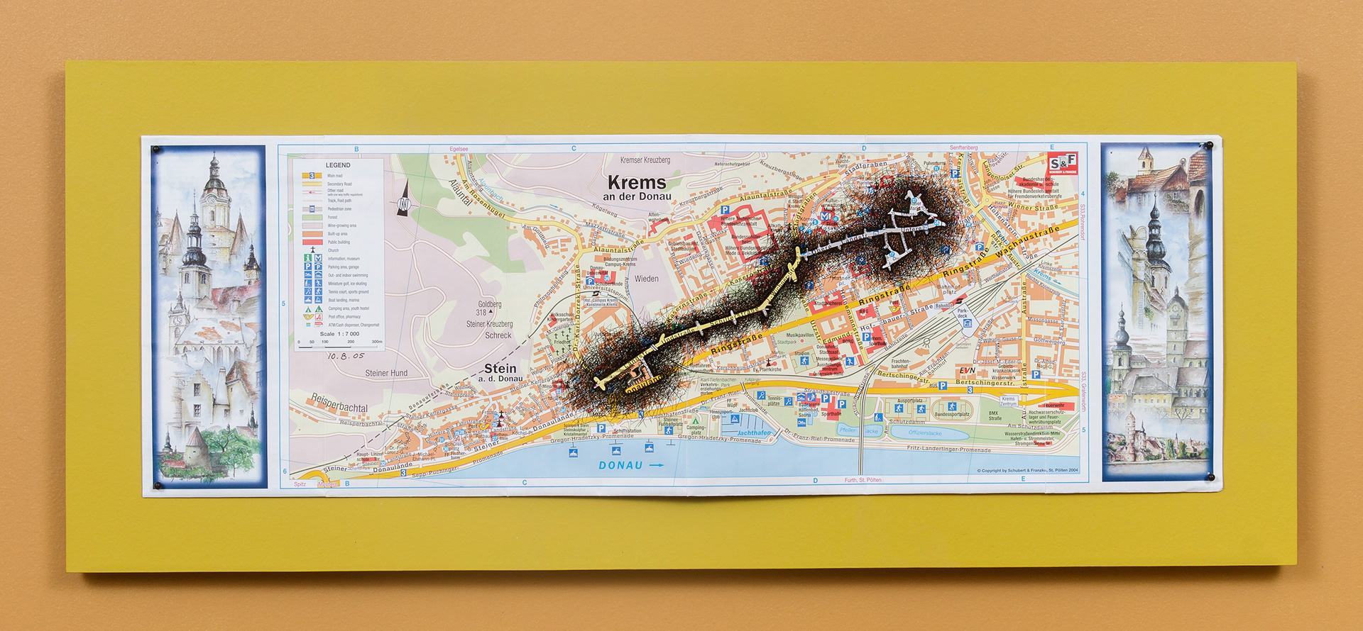 [K1a] Ant Farm Self-Portrait: Where did I travel within Krems-Stein, Austria from 25/7/05-18/8/05? - Day 17: 10/8/05, 2005-08 archival ink on tourist map pinned on painted wood panel 8 x 24 x 1 in (20.32 x 60.96 x 2.54 cm)