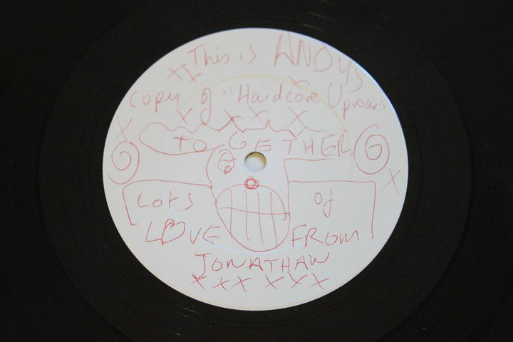 Jonathans handwriting on a white label of Hardcore Uproar