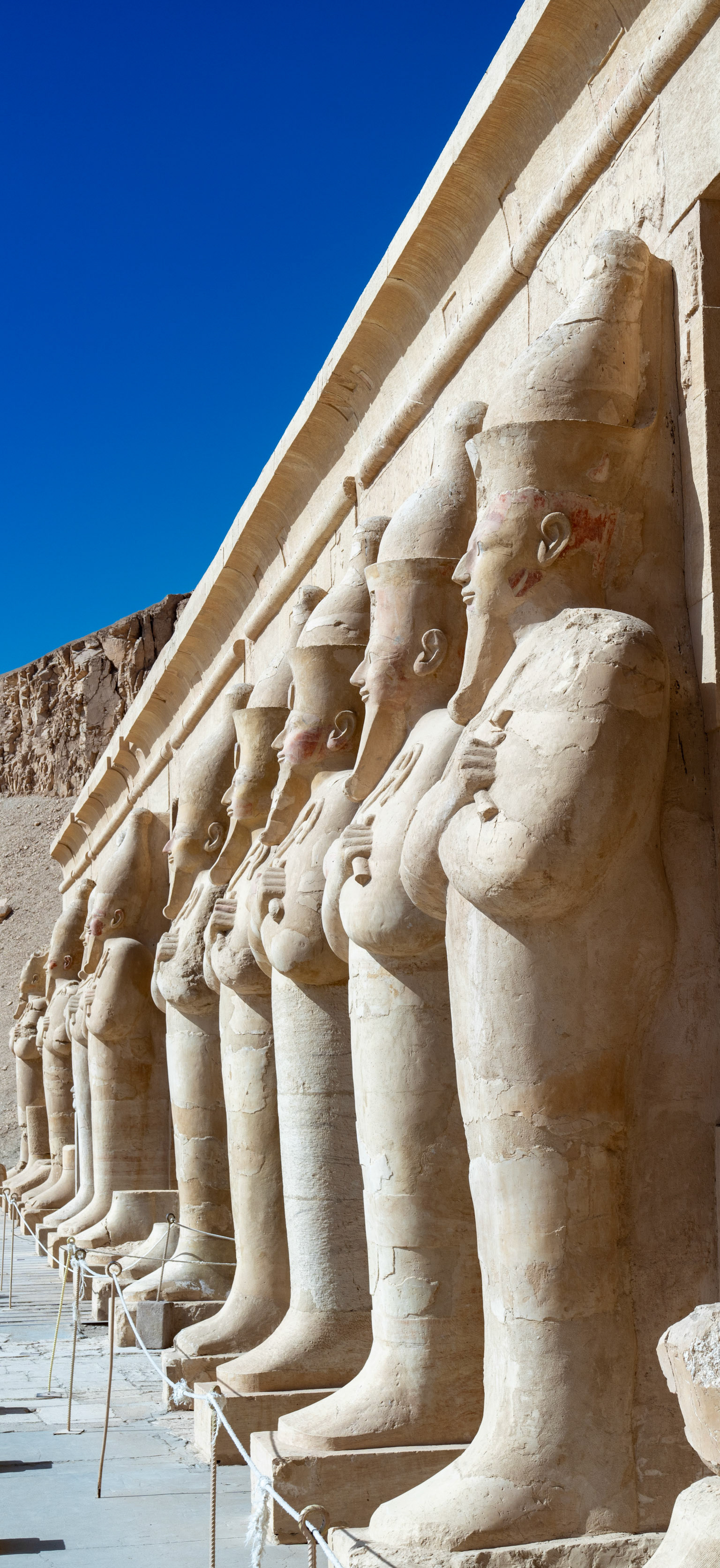 Statues at the entrance to the upper platform of Hatshepsut's temple