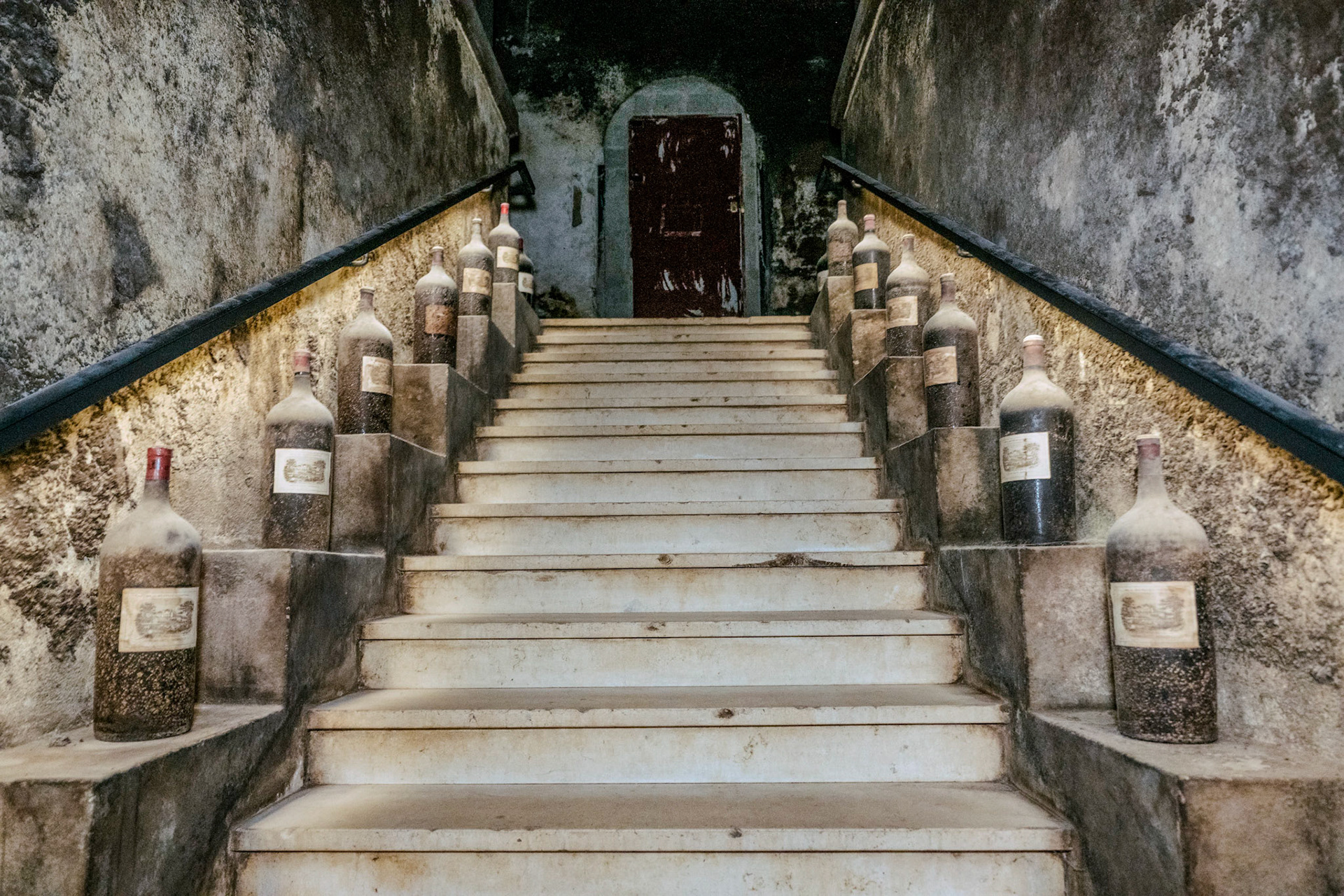 Aged imperials on the cellar steps of Château Lafite Rothschild