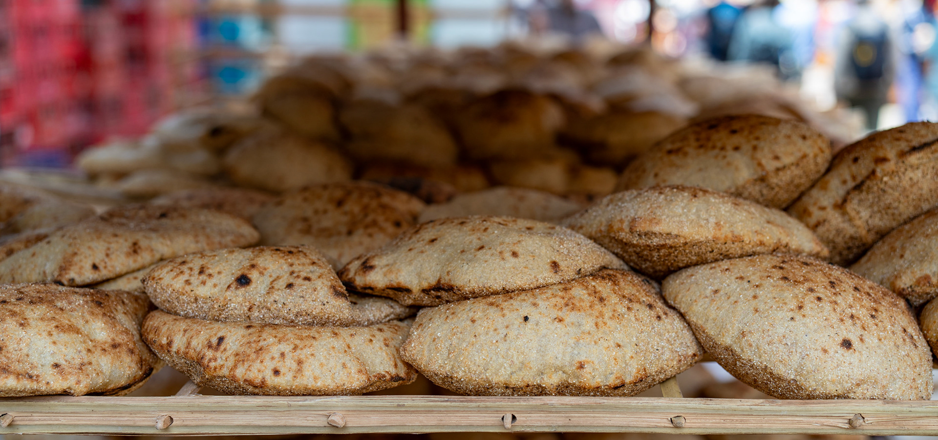 Bread cooling on racks at the Aswan spice market