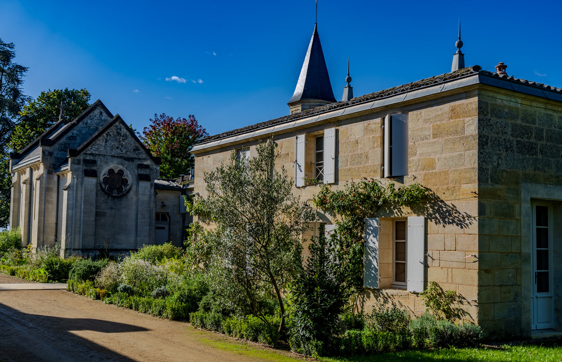 Château Cheval Blanc, church, and herb garden