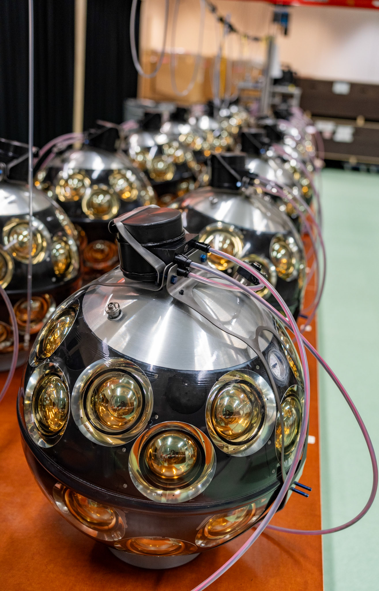 Nikhef assembled KM3NeT digital optical modules (DOMs) with 31 phototubes used to measure Cherenkov radiation from neutrinos.