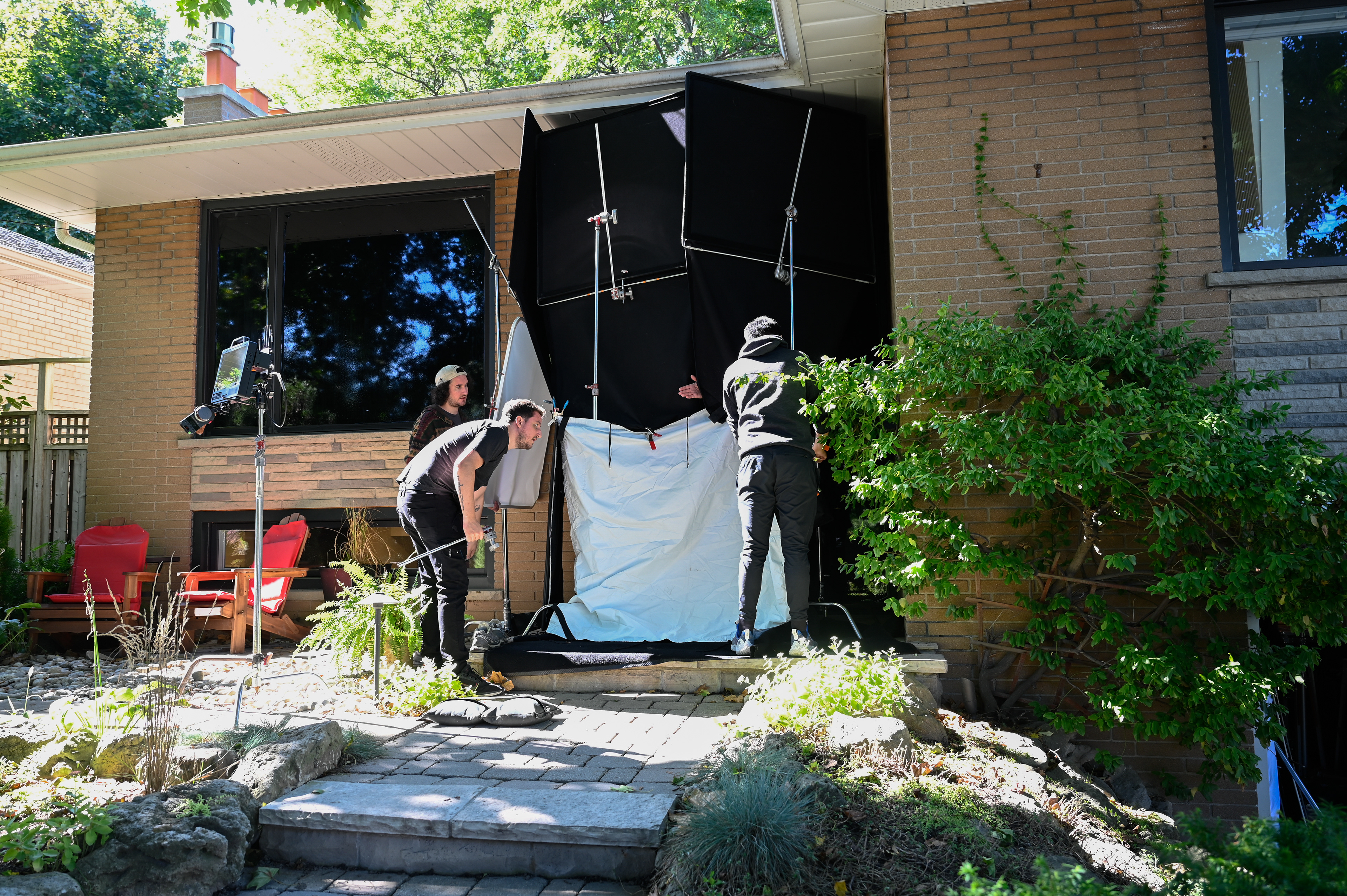 Time Eater crew setting up exterior tenting