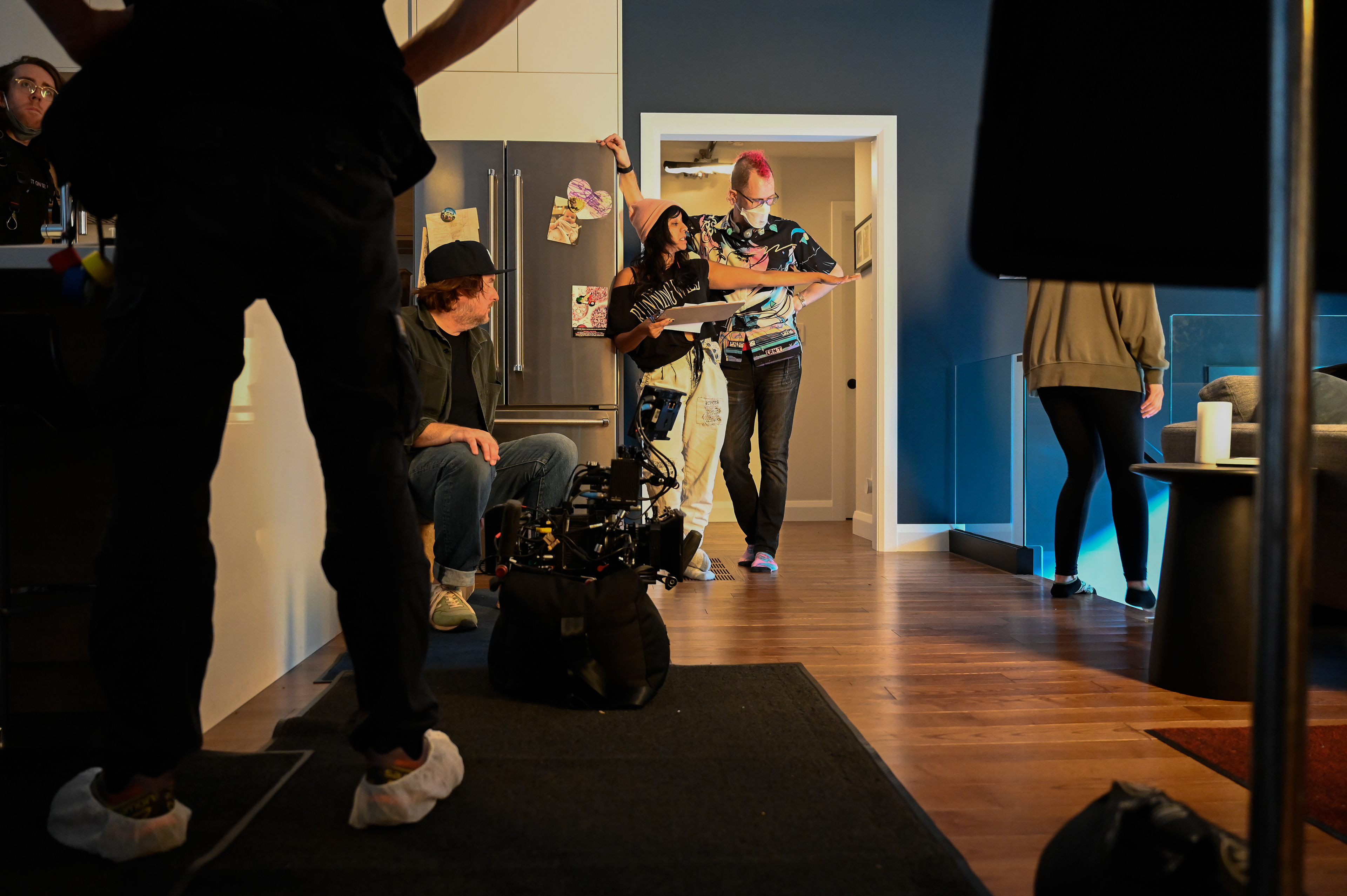 Director Ryan Couldrey working with first AD Maya Bastian