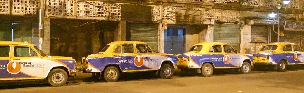 Bandhan Bank Branded cabs in a row