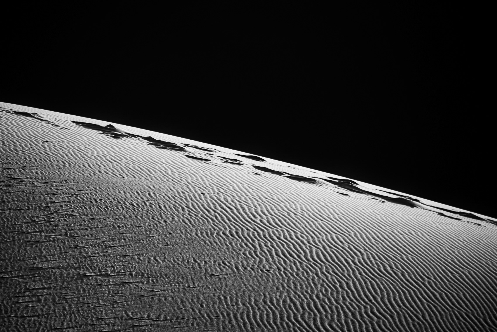 EPHEMERAL FOOTPRINTS IN THE SAND OF THE SAHARA