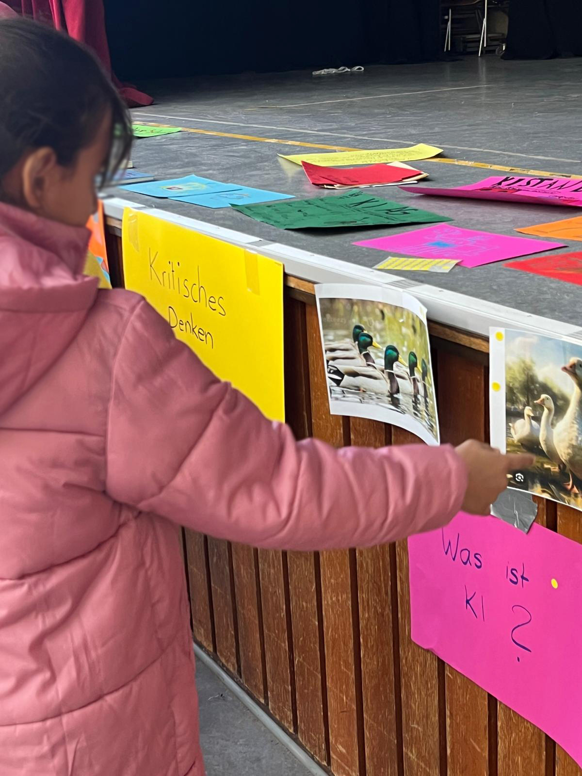 One participant is browing through the collection of associated sources and thoughts around AI during a rehearsal.