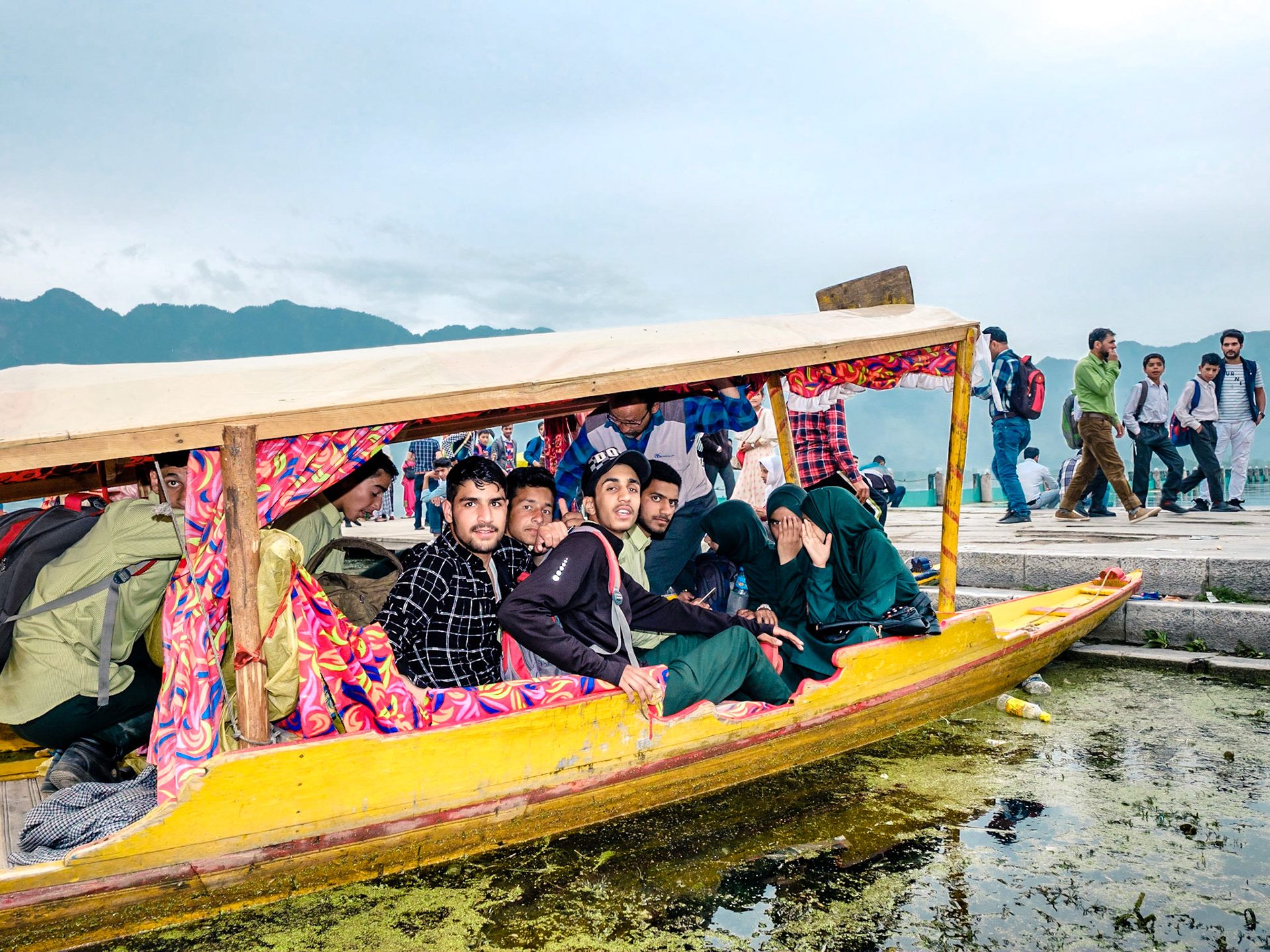 In the summer of 2019, when Kashmir was still an "integral part of India" and not yet an integrated part of India, I was floating around Dal Lake on a shikara. A student beckoned me to take a picture of him and his buddies, and in one split Kashmiri instant, it all came together. He shouted out his whatsapp number to me, digit by digit, as our boats drifted apart. We kept in touch until one fair and foul day in August his number went cold.