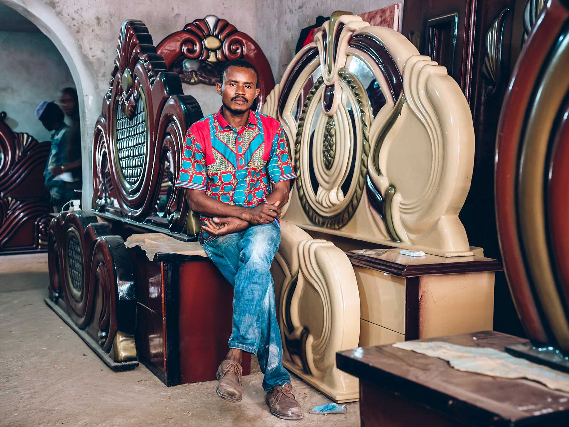 Abubakar Kamara from Sierra Leone works as an ébéniste (cabinetmaker) in Conakry, Guinea.