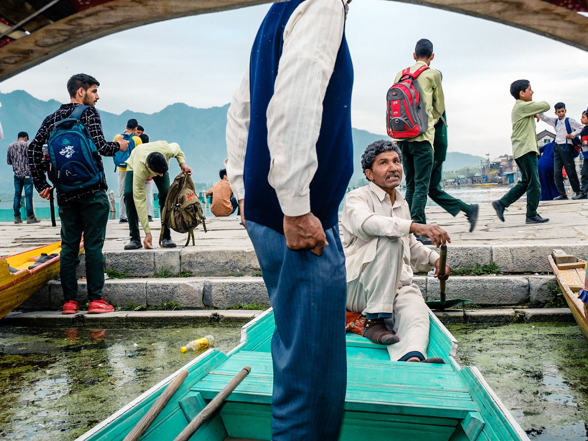 Boatman and shikara. Srinagar, Kashmir, 2019.