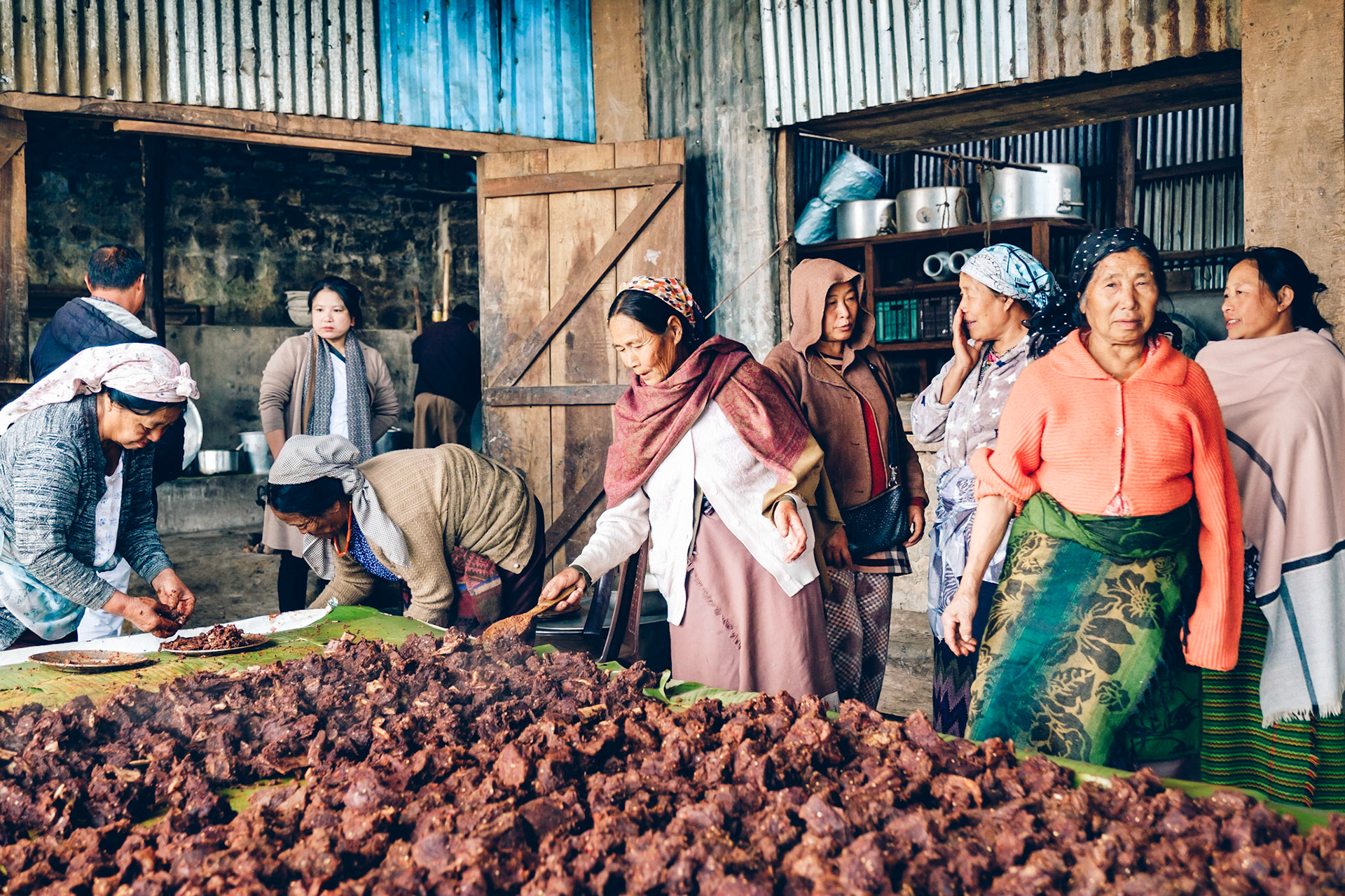 Preparations preceeding the feast of Akangla &amp; Avizo's wedding. Here we witness the making of 'modi' - a sought-after preparation of beef wrapped in a banana leaf and distributed to guests as a parting gift.
